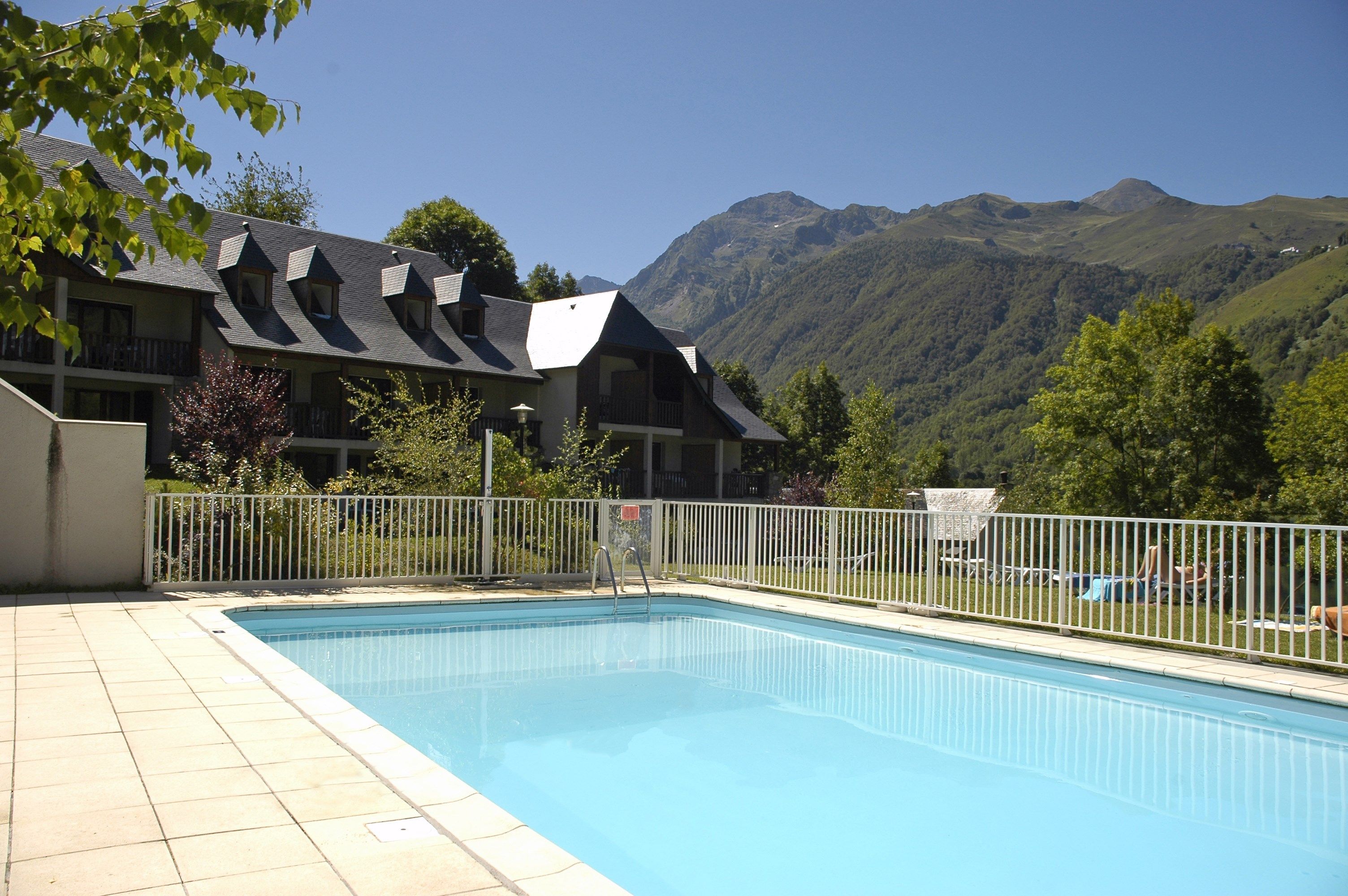 image Take a dip in the gorgeous outdoor pool during the summer.
