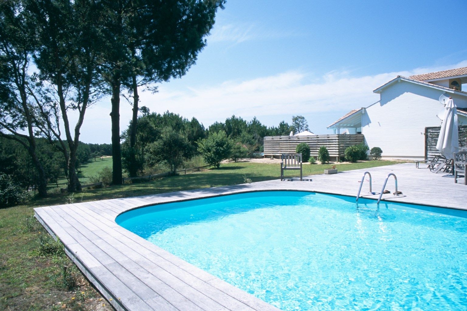 image Take in gorgeous views while lounging around the outdoor pool.