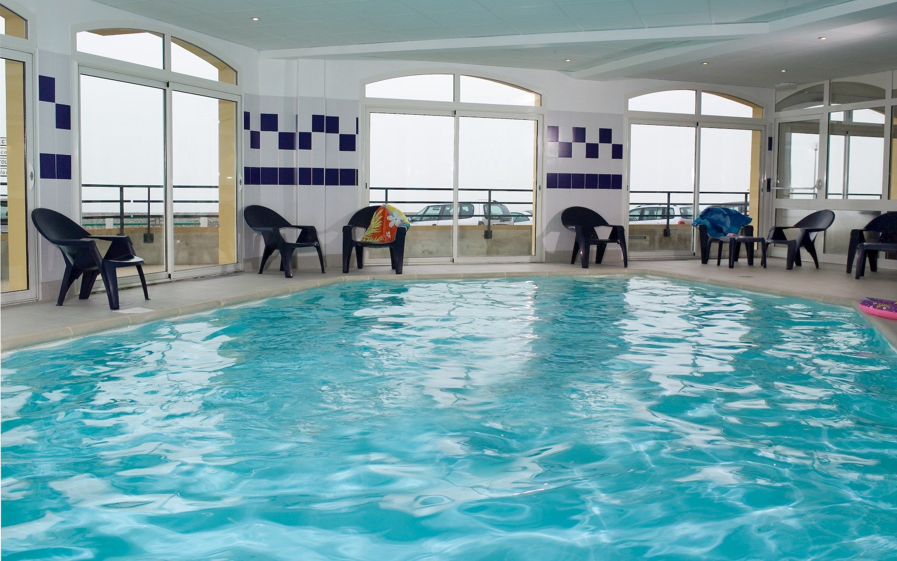 image Dive into the shared indoor pool after a great day outside.