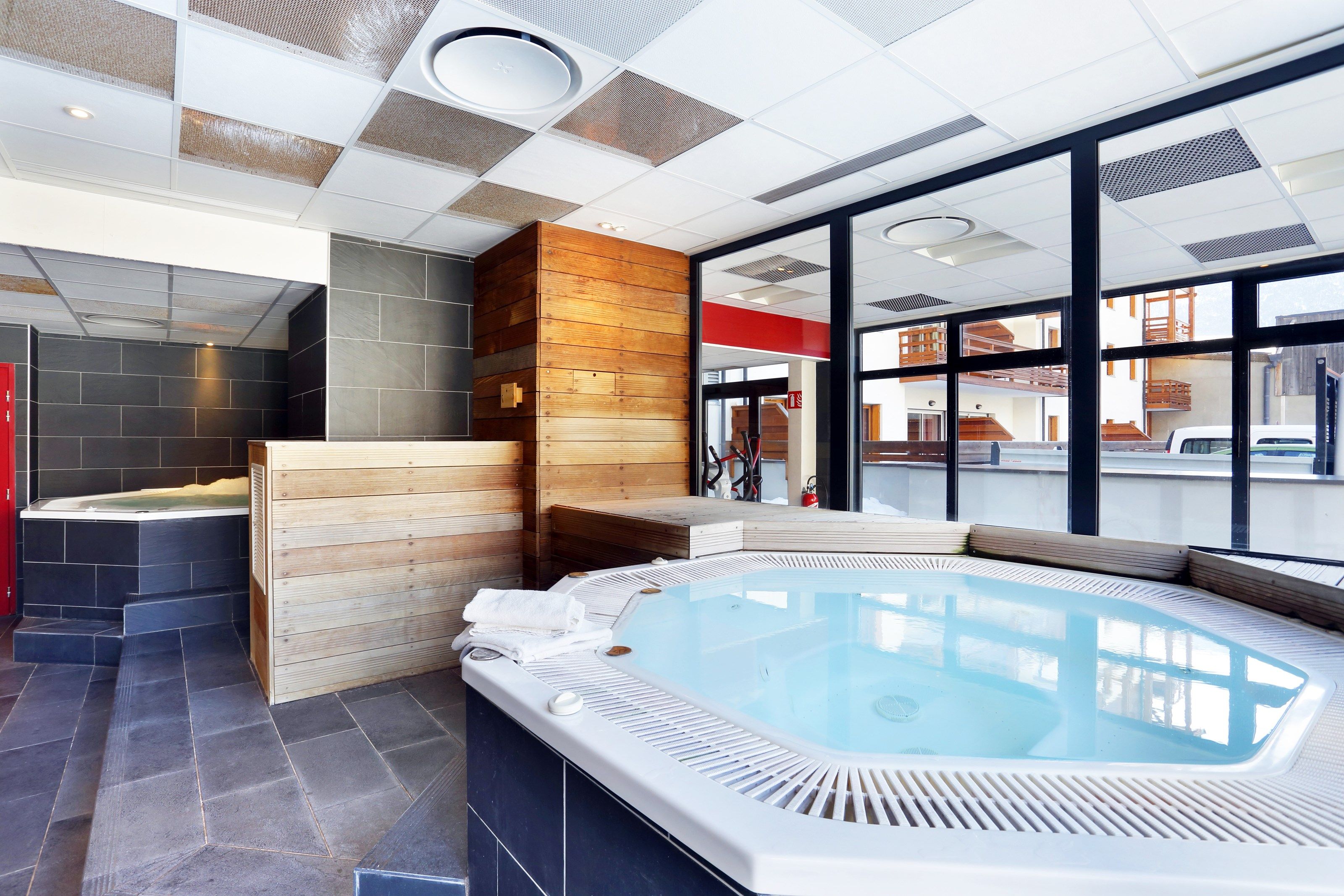 image Soak sore muscles in the shared indoor hot tub.