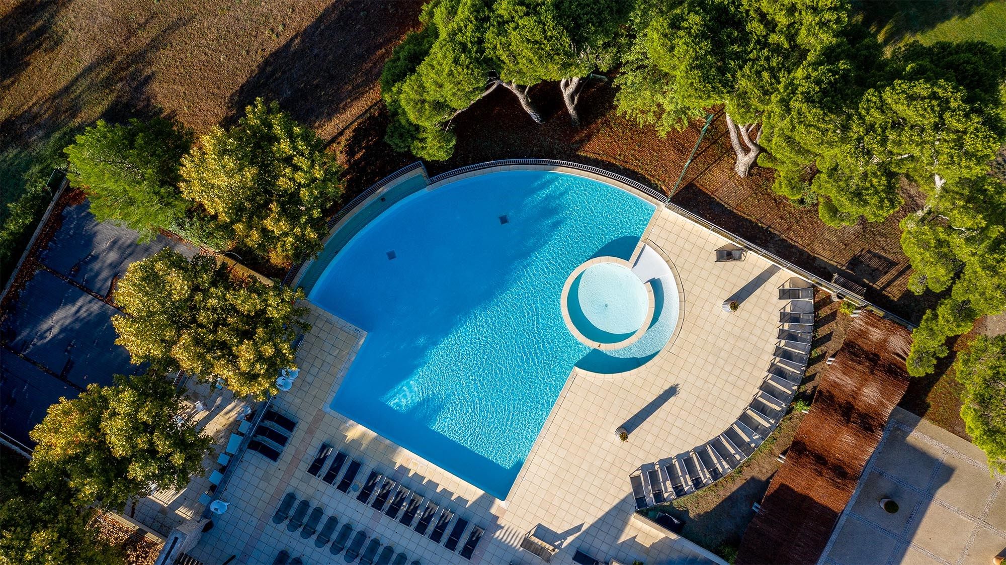 image Lounge by the pool in the sunshine.Take a dip in the outdoor pool.