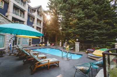 Dive into the gorgeous outdoor pool on a hot summer day.