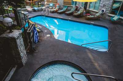 Lounge around the on-site outdoor pool.