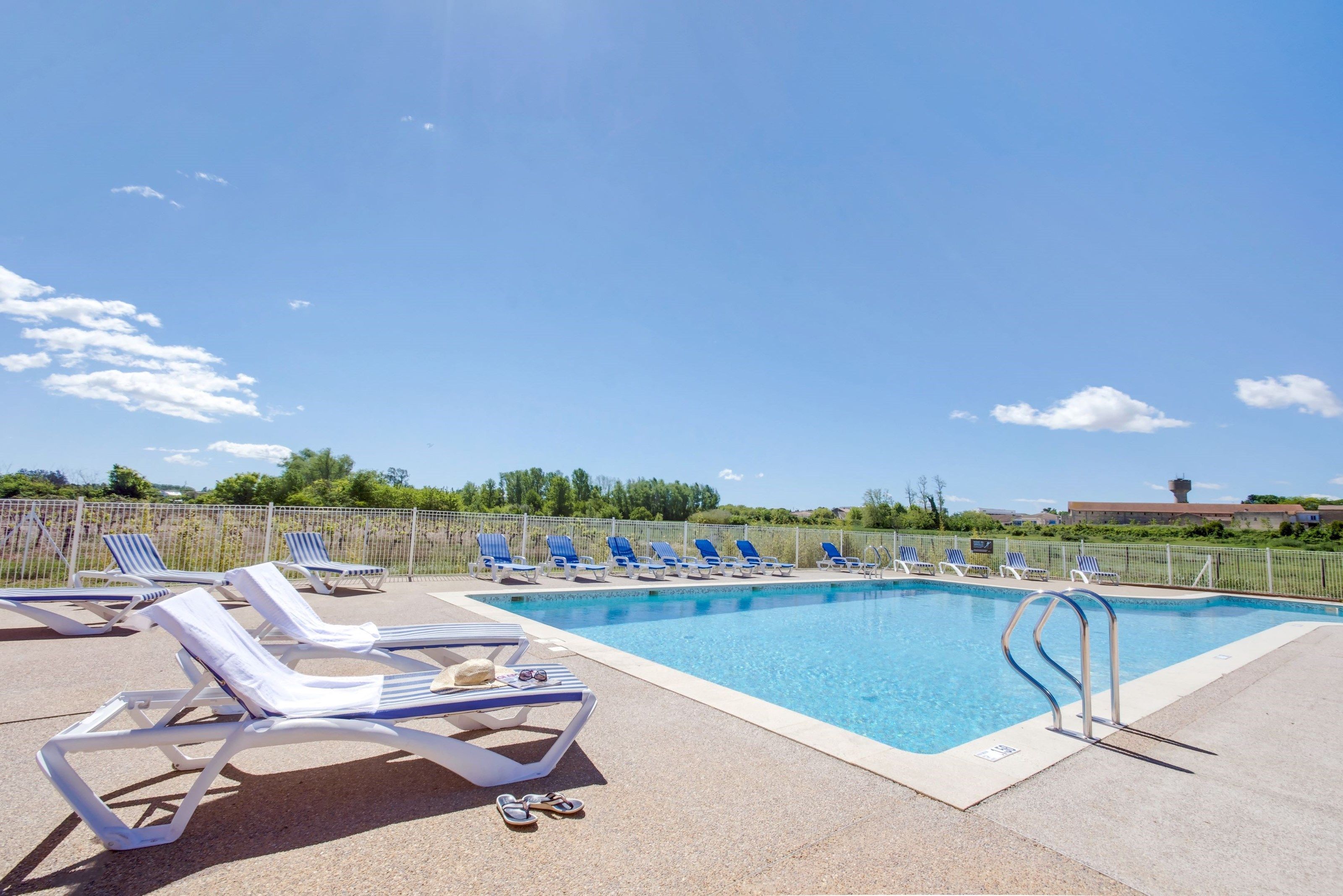 image Take in gorgeous views while lounging around the on-site outdoor pool.