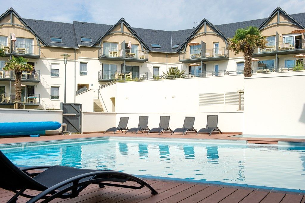 image Take in gorgeous views while lounging around the on-site outdoor pool.