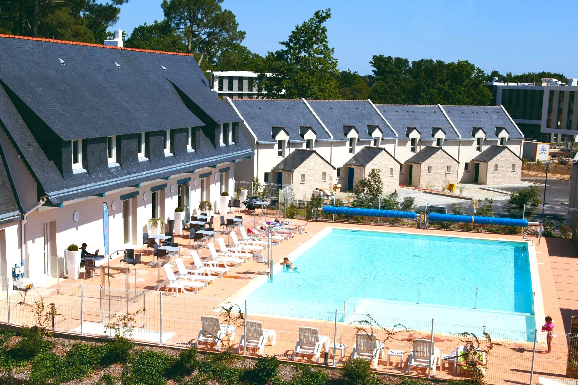 image Take in gorgeous views while lounging around the on-site outdoor pool.