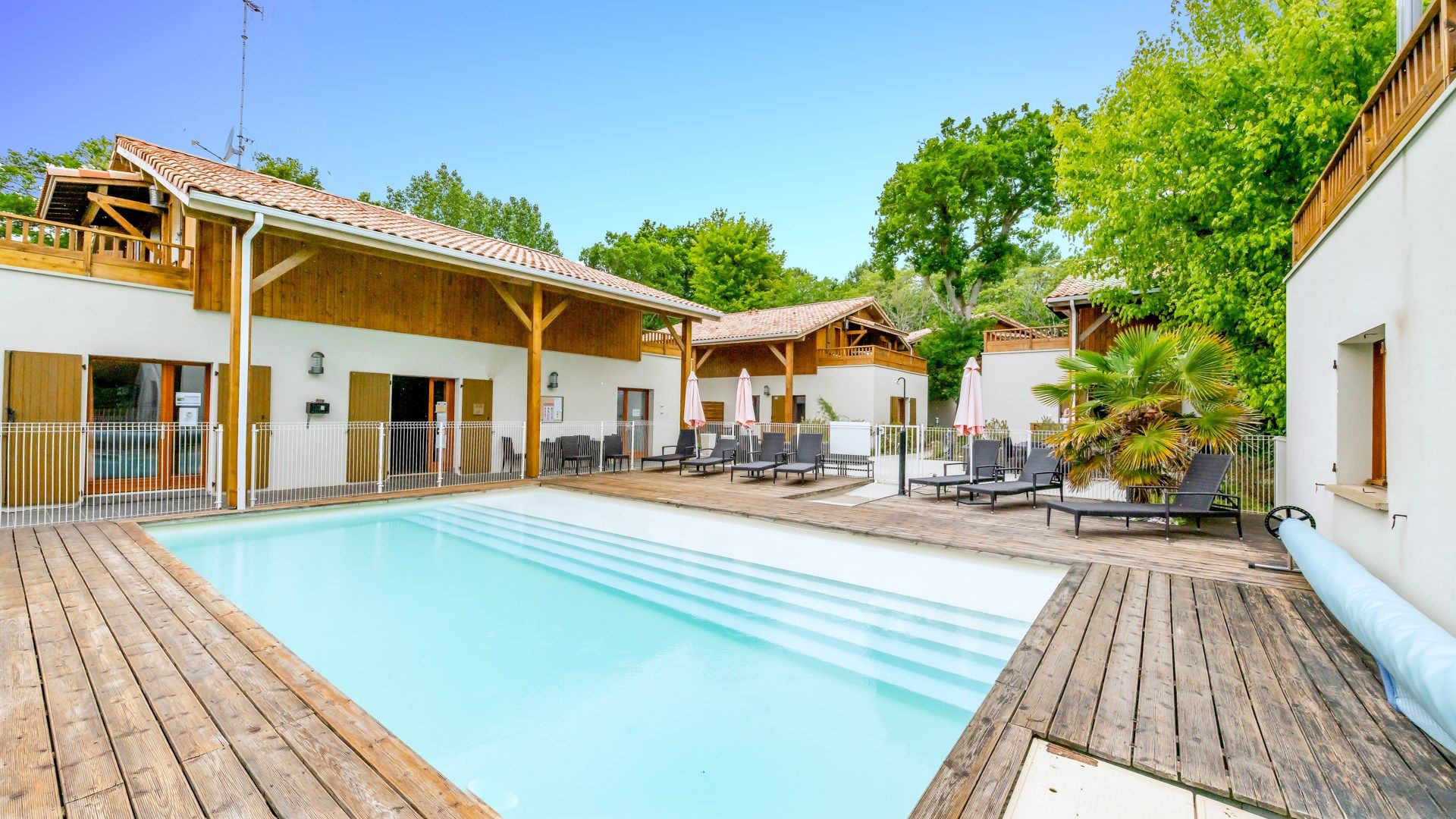 image Dive into the lovely outdoor pool during the summer.