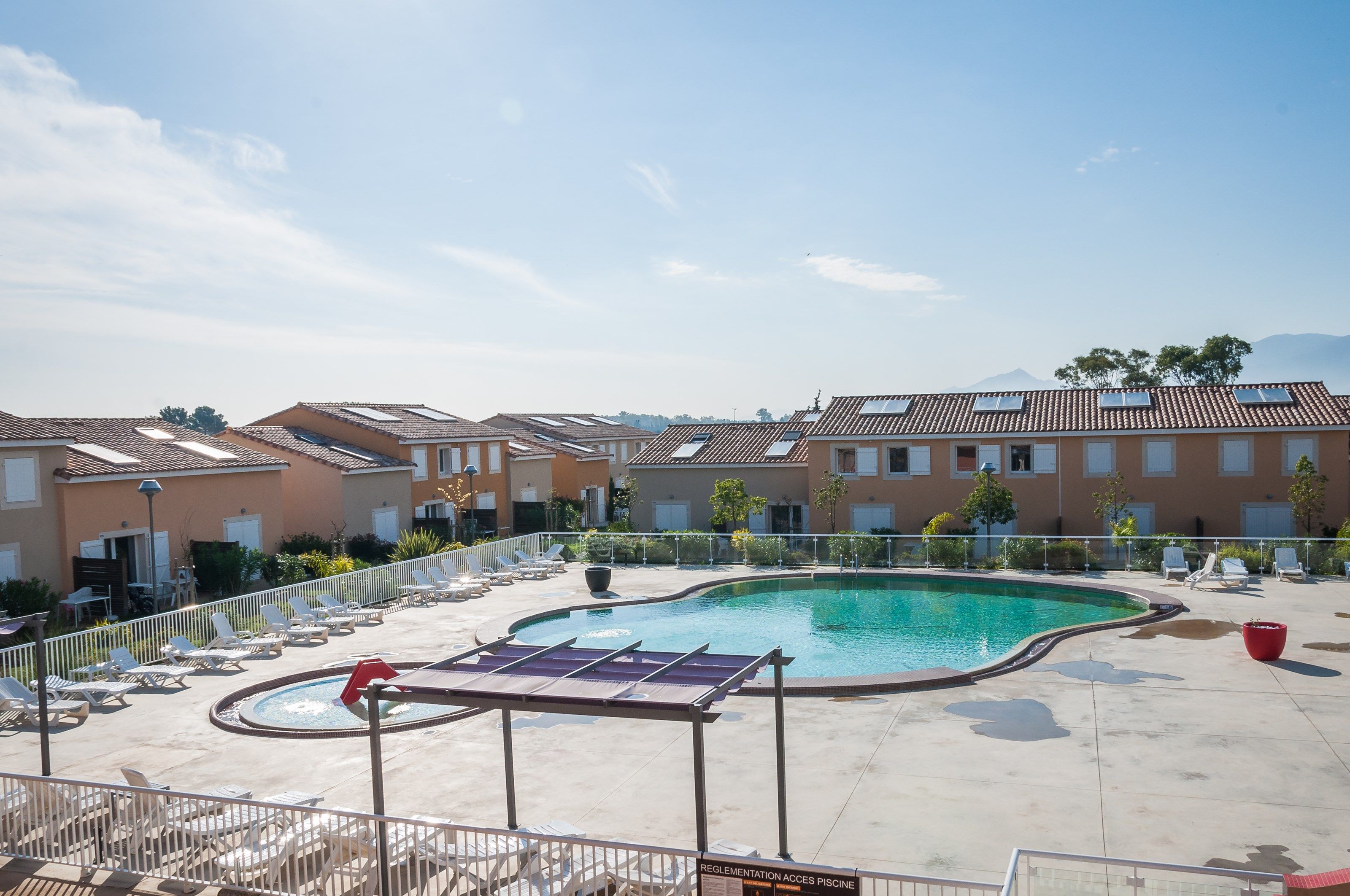 image Spend time with family and friends in the outdoor pool during the summer.