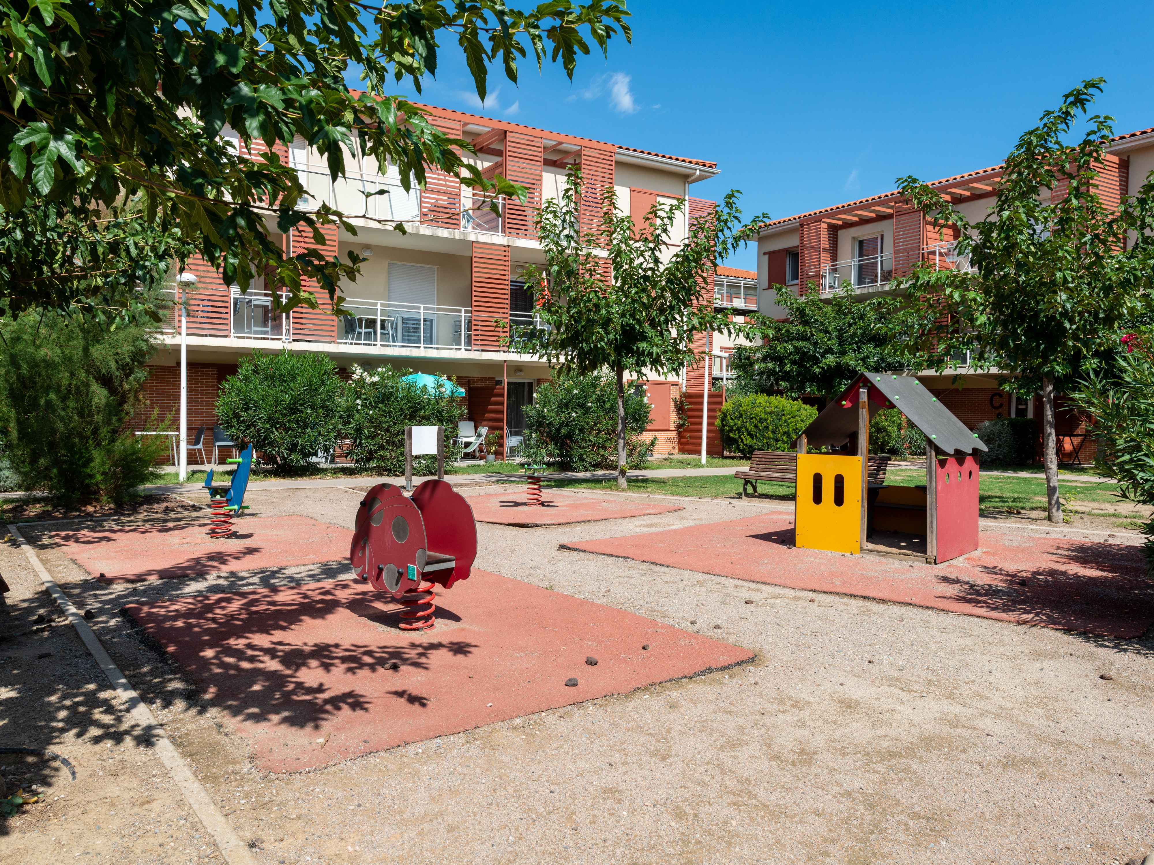 image Fun for the whole family with a well equipped playground. 