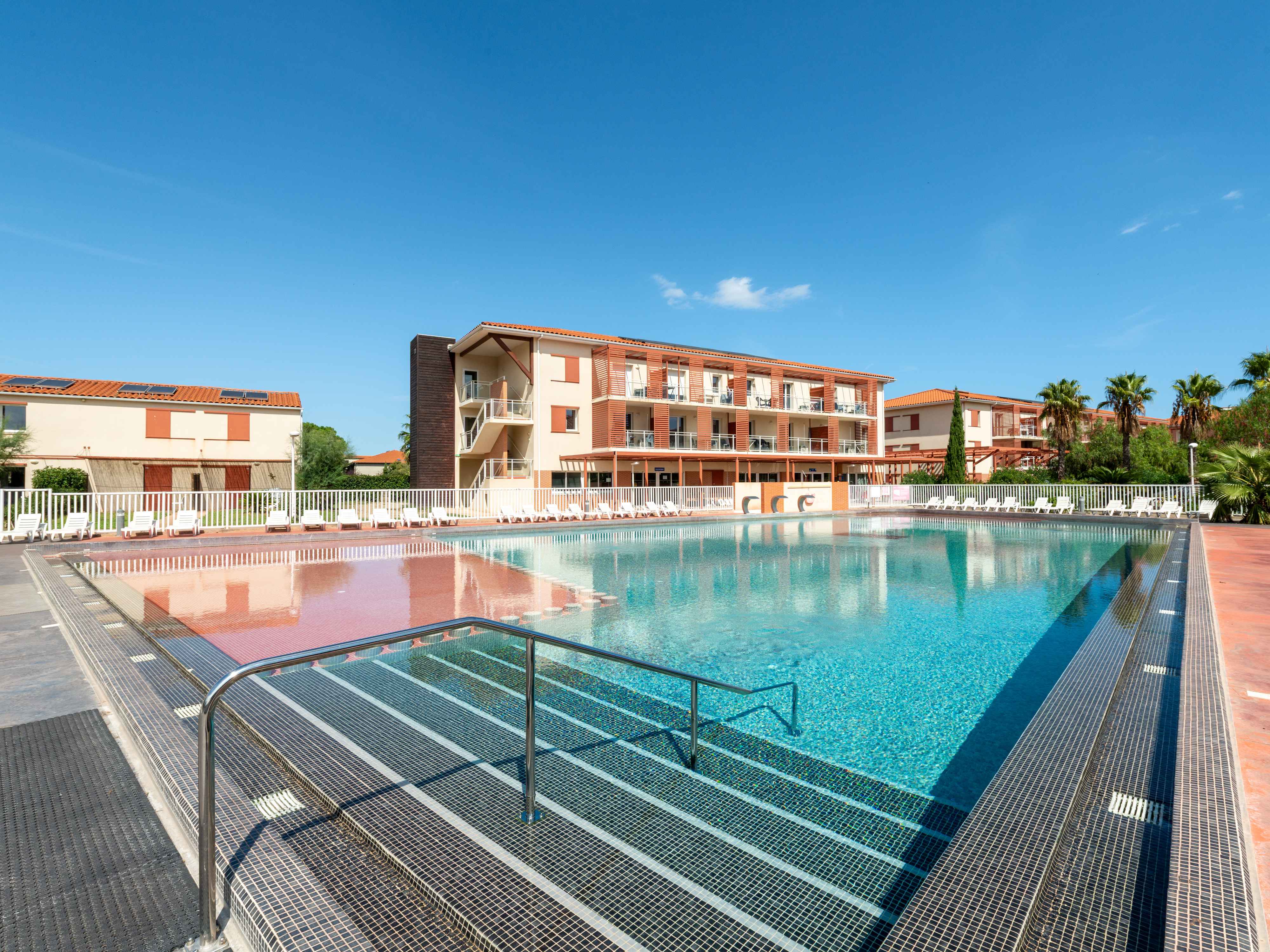 image Dive into crystal-clear pool paradise!