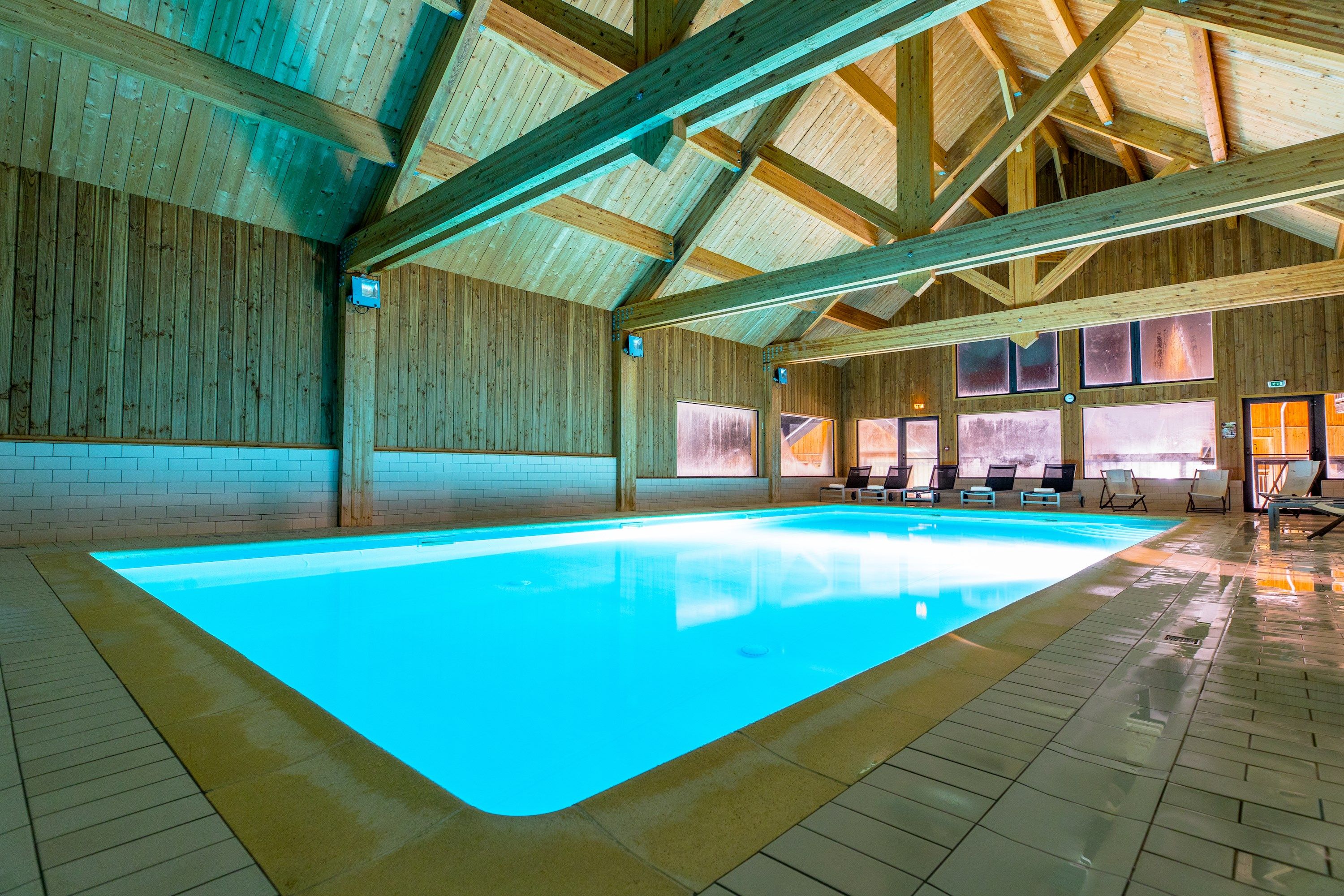 image Dive into the lovely heated indoor pool after a great day!