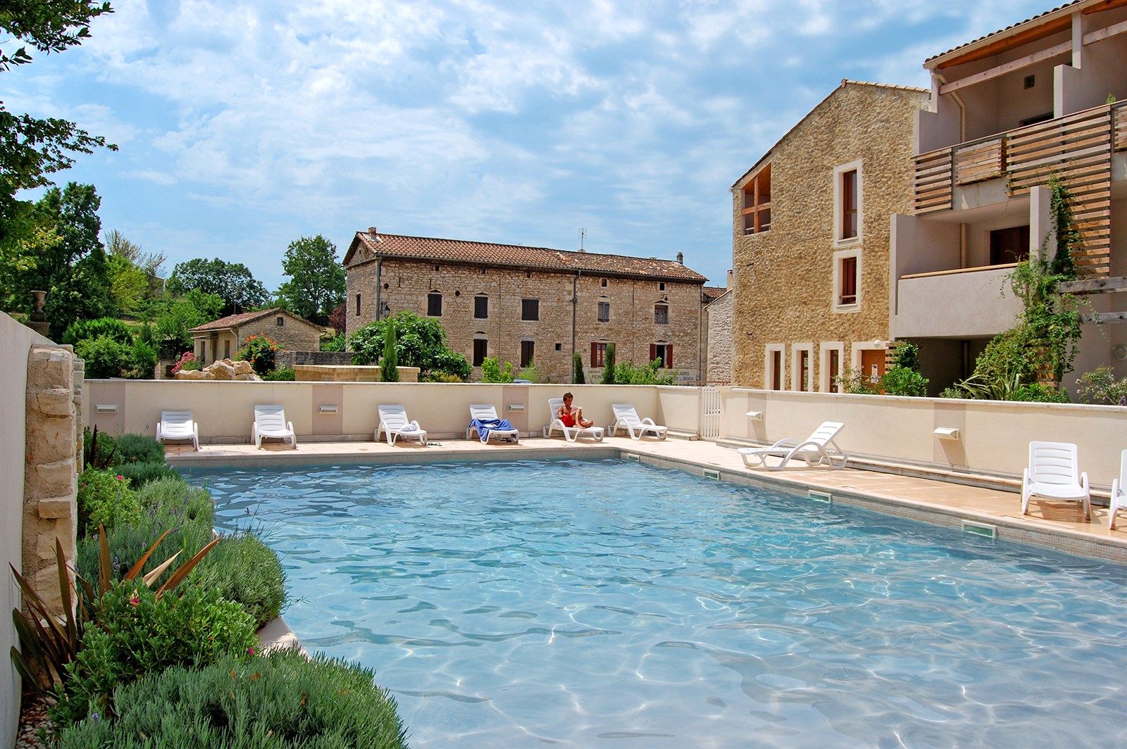 image Take in gorgeous views while lounging around the on-site outdoor pool.