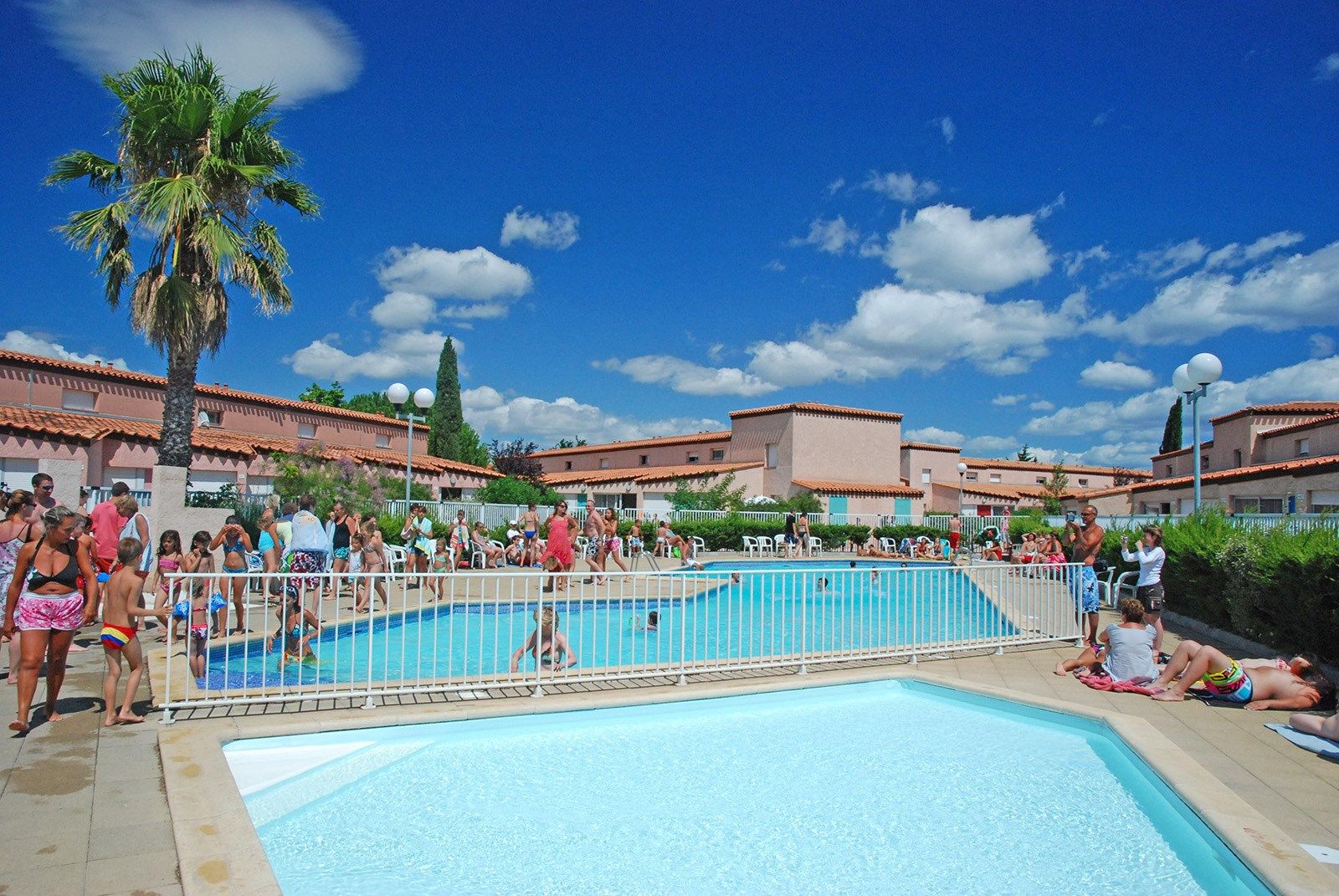 image Relax at the outdoor pool during summer.