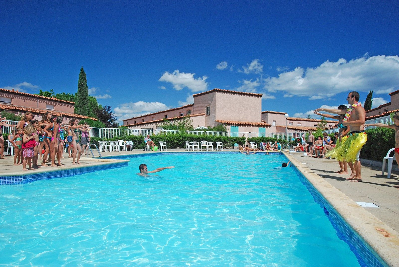 image Spend time with family and friends in the outdoor pool during the summer.