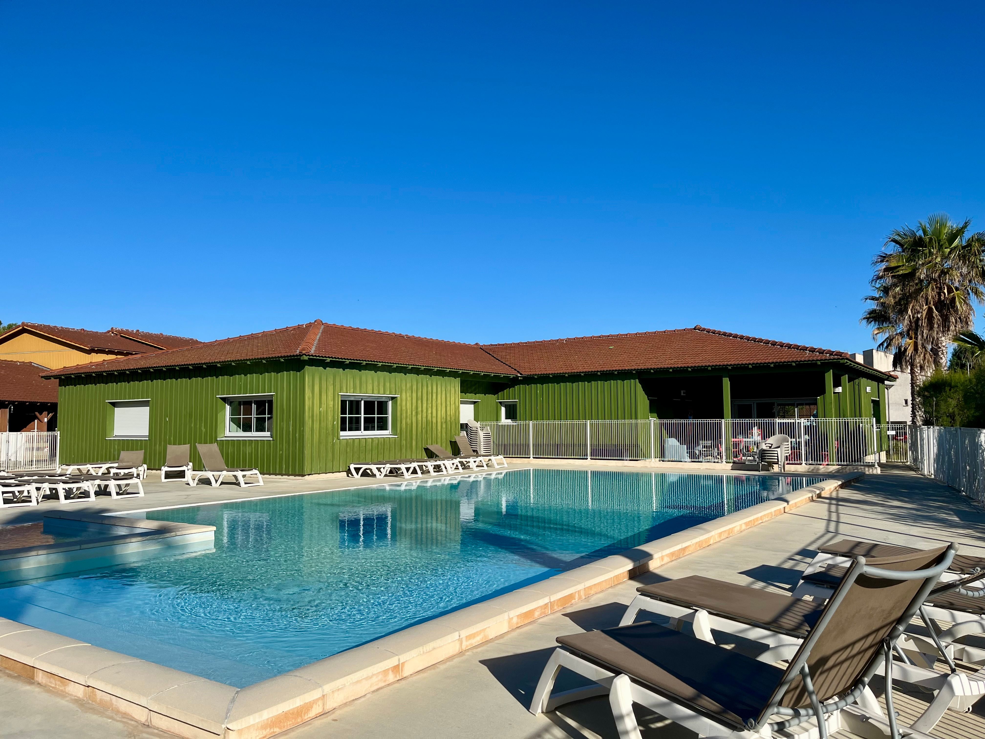 image The seasonal outdoor pool is your spot to cool off before an evening stroll to the beach.