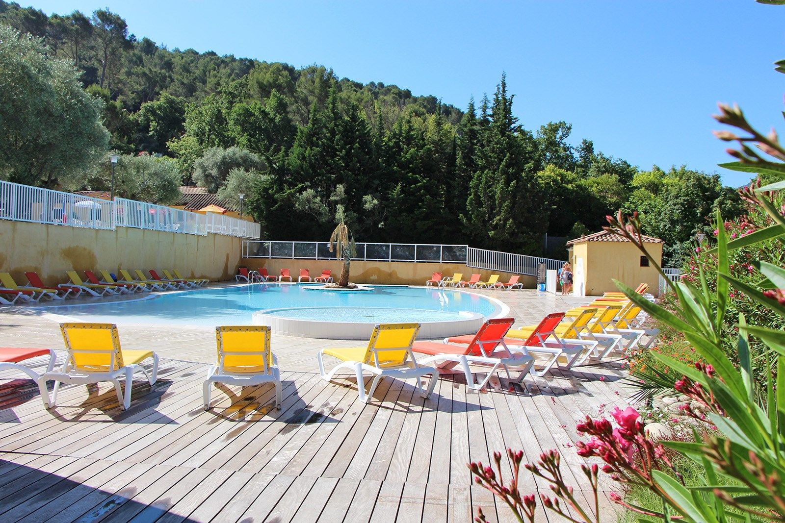 image Relax on the sun loungers around the pool.