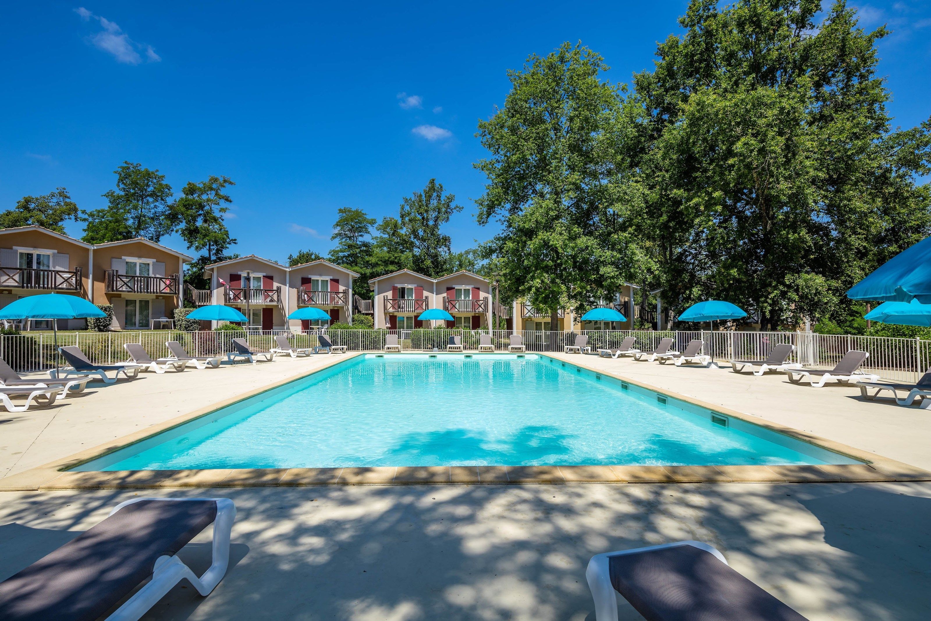 image Dive into the gorgeous outdoor pools on a hot summer day.