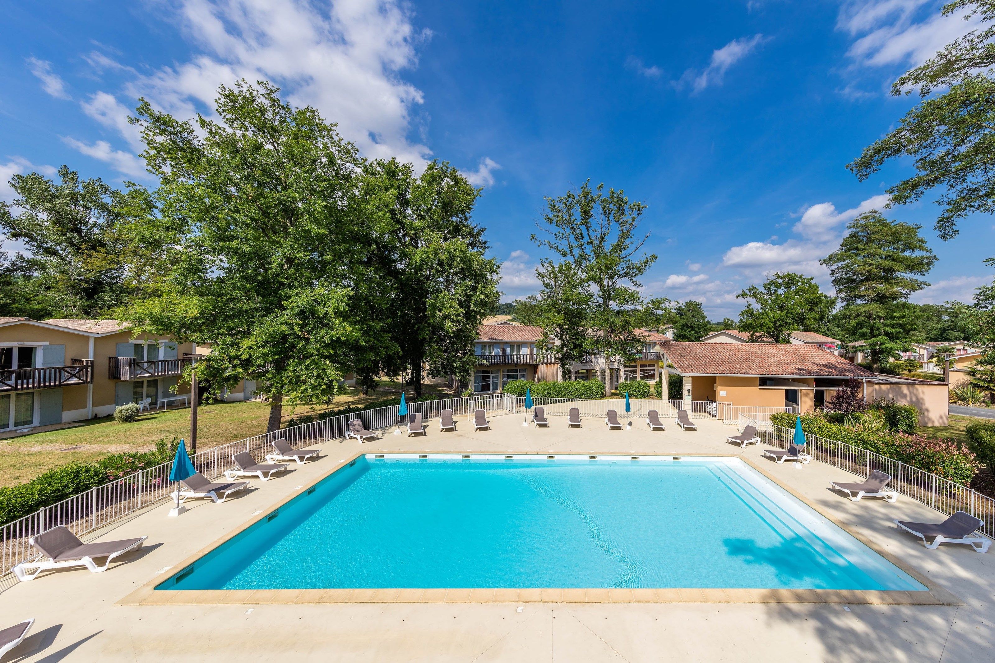 image Take in gorgeous views while lounging around the on-site outdoor pools.