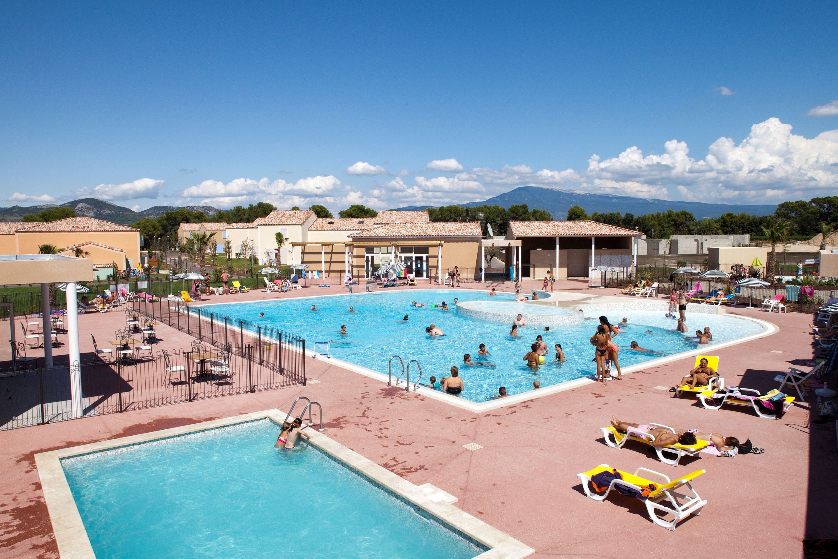 image Spend time with family and friends in the outdoor pool during the summer.