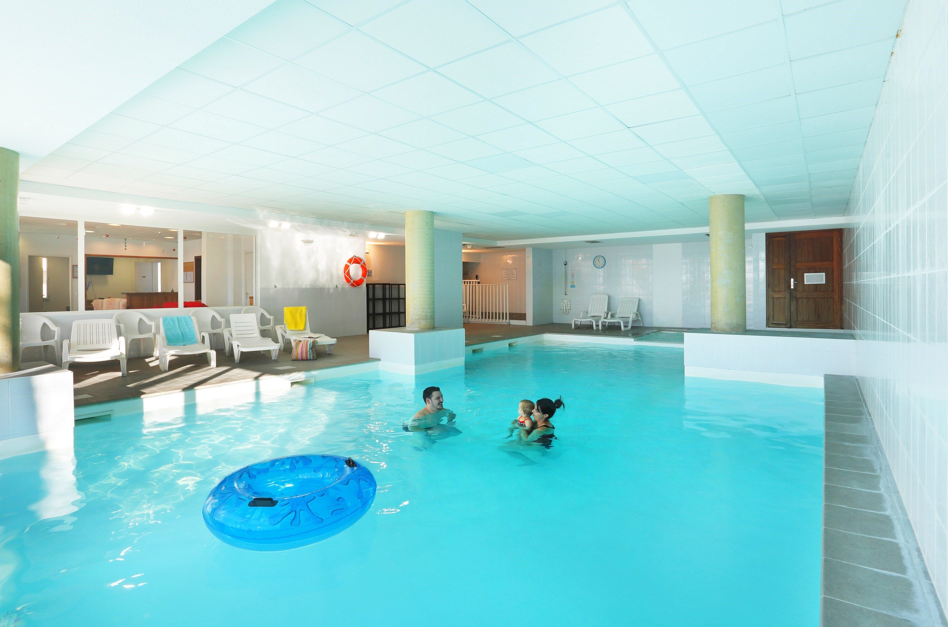 image Dive into the lovely indoor pool after a wonderful day outside.