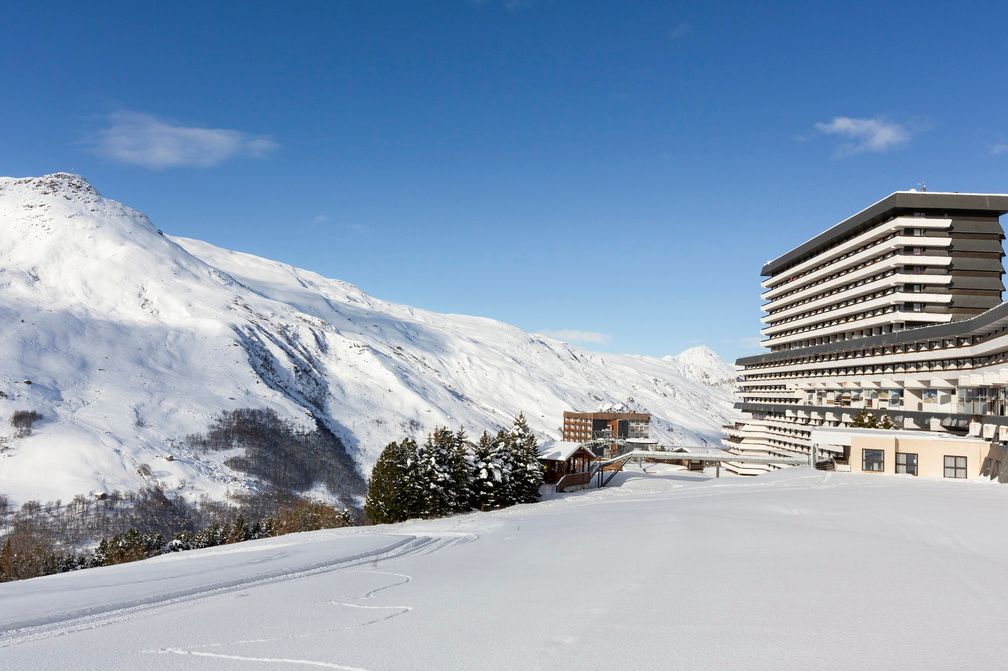 image Snow-dusted rooftops and the Trois Vallées peaks behind — the slopes are a short ride from the front door.