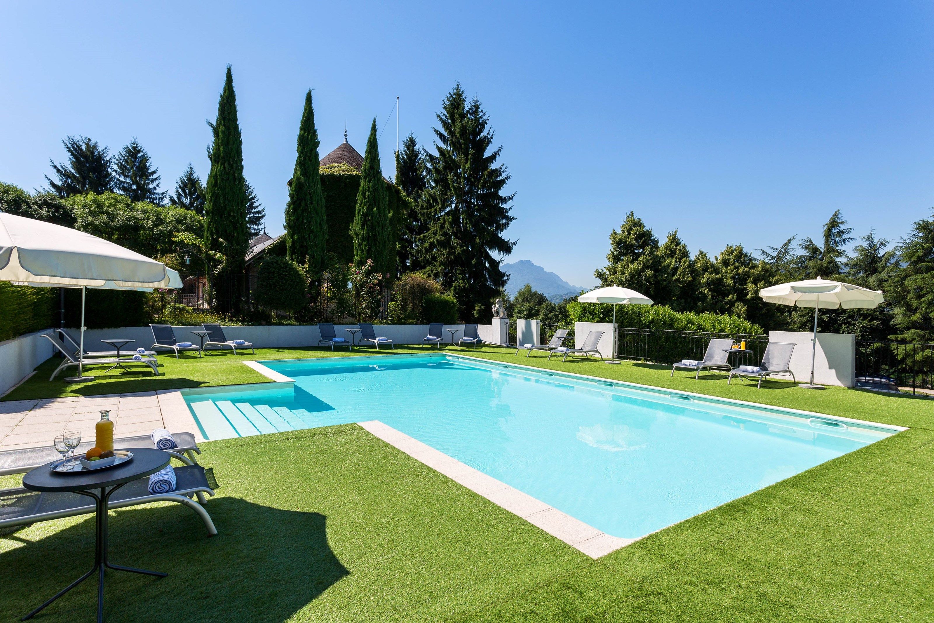 image Dive into the lovely outdoor pool during the summer.