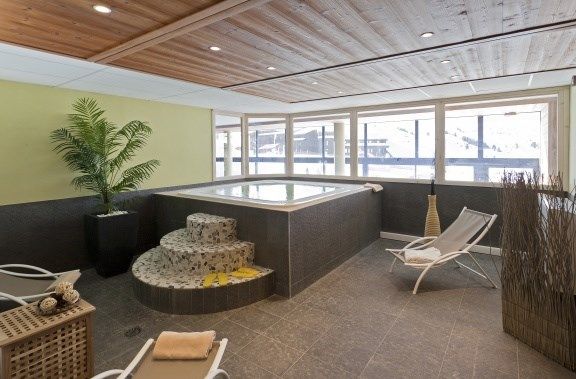 image Soak sore muscles in the indoor hot tub.