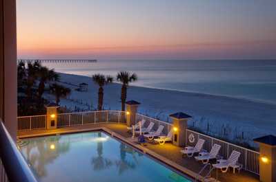 Take in gorgeous views while lounging around the on-site outdoor pool. Please note that the views from your condo will vary, though all condos have a beach view.