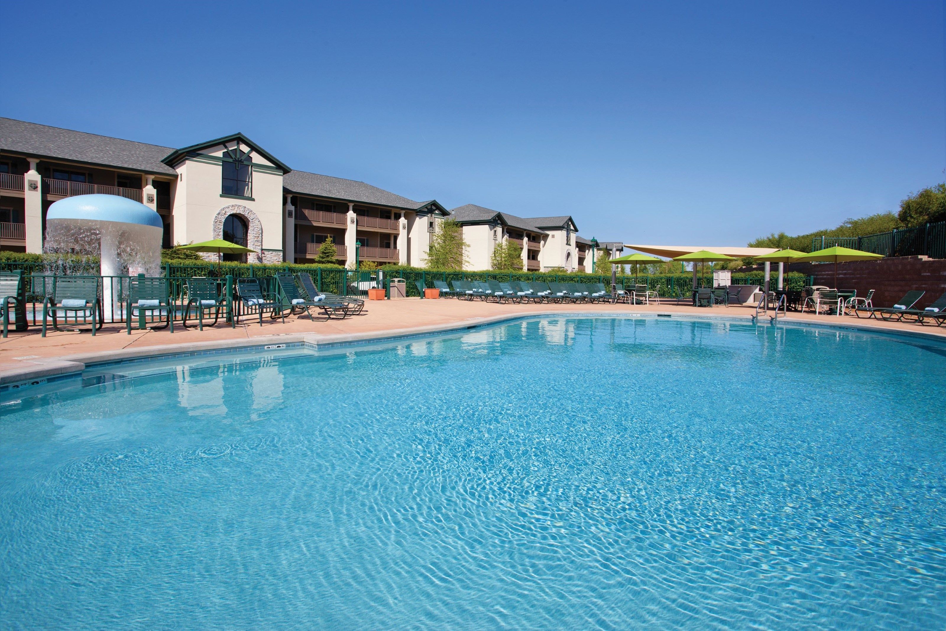 image Take in gorgeous views while lounging around the on-site outdoor pool.
