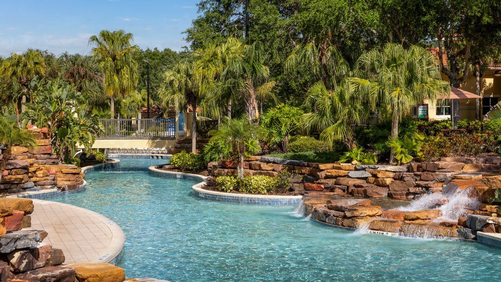image Drift along the serene lazy river, surrounded by lush greenery and soothing water.