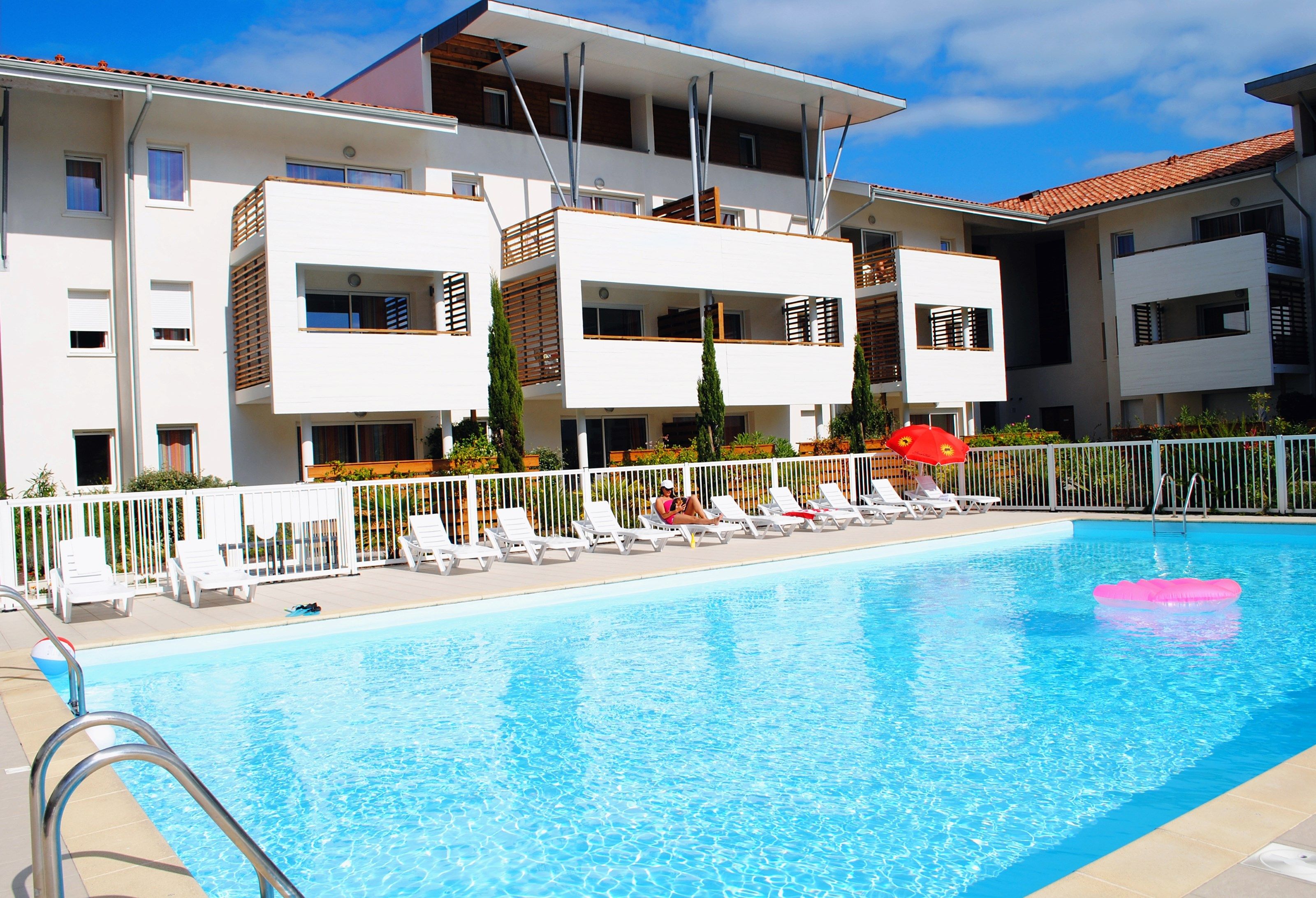 image Spend time with family and friends in the outdoor pool during the summer.