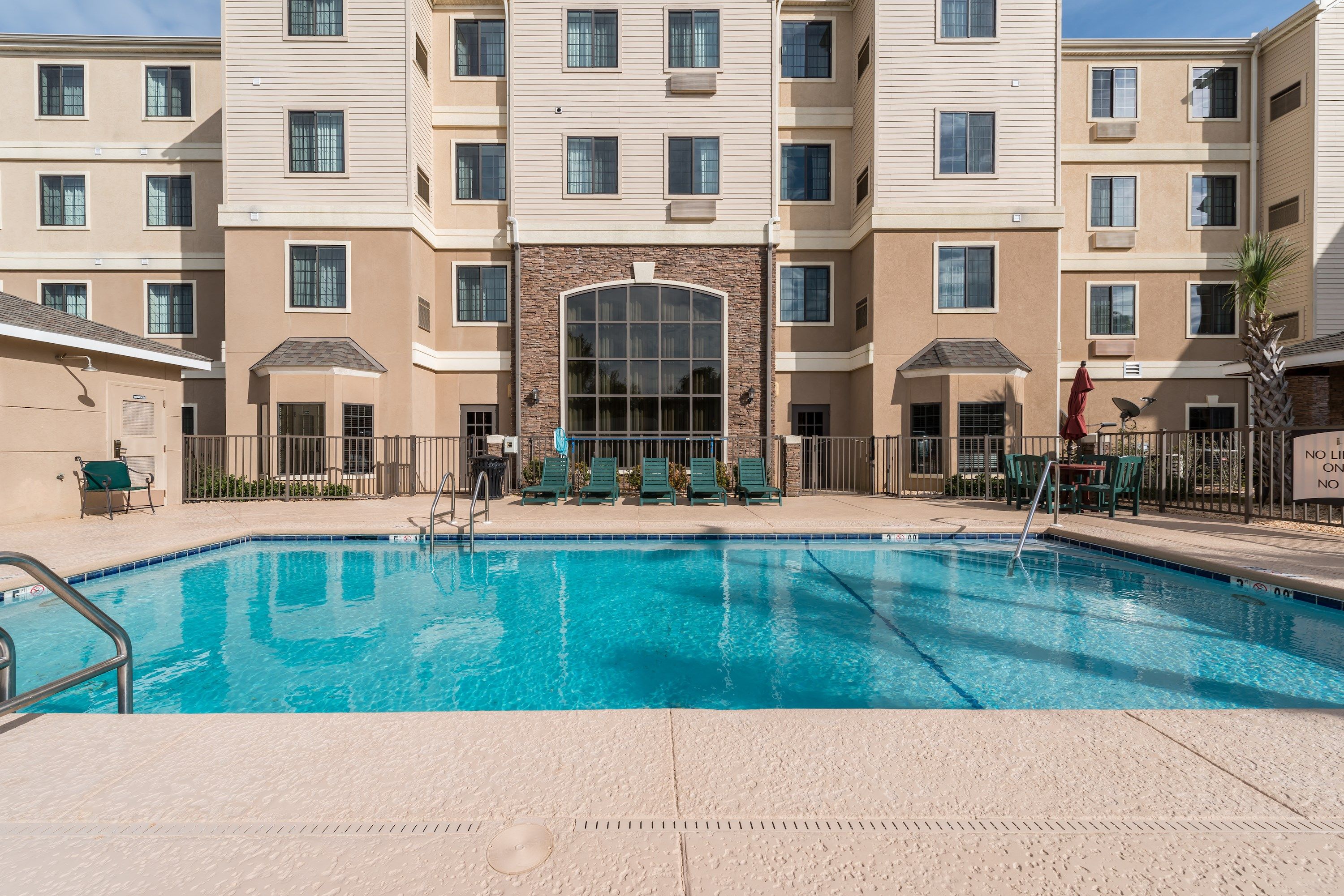 image Spend time with family and friends in the outdoor pool during the summer.