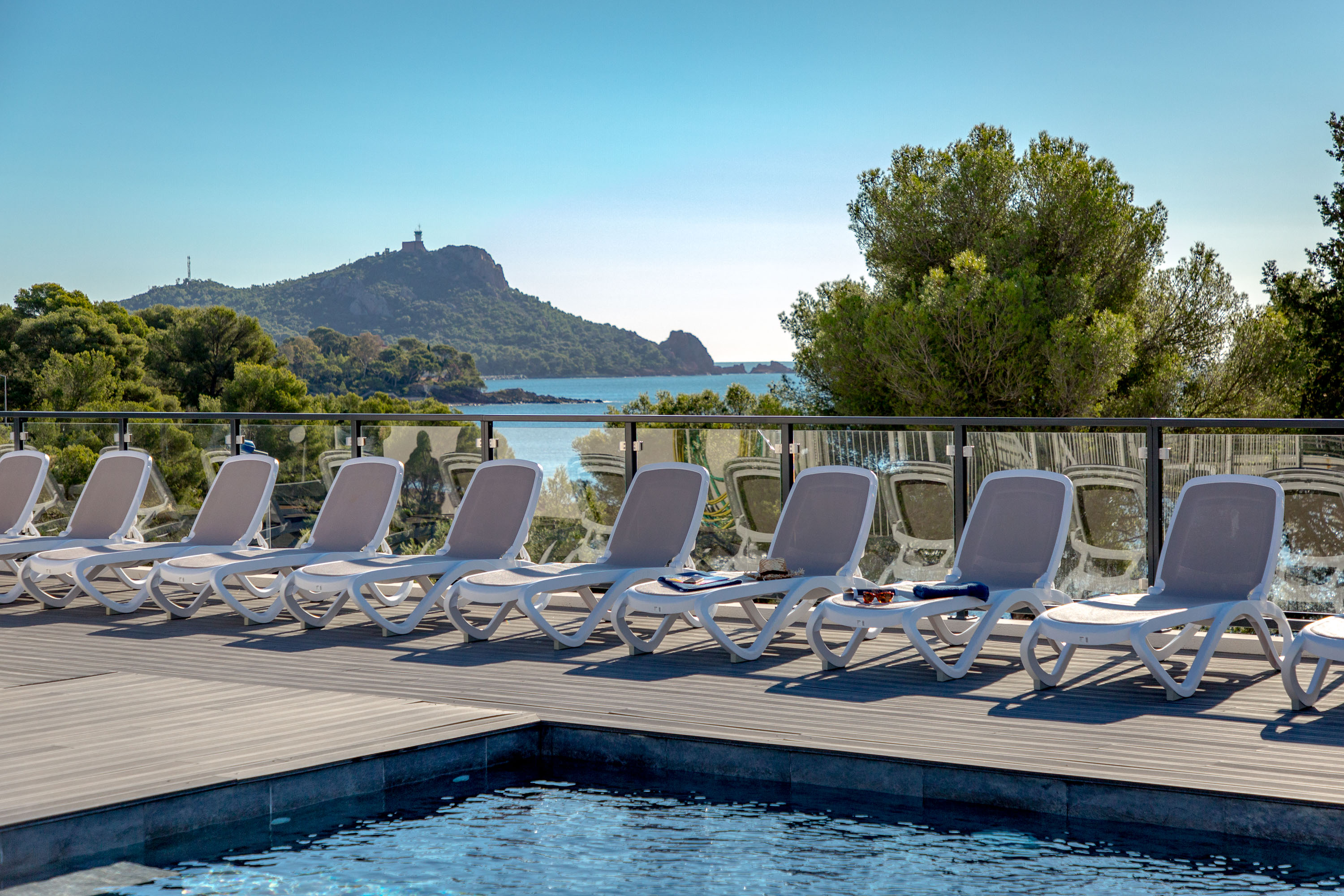 image Take in gorgeous views while lounging around the on-site outdoor pool.