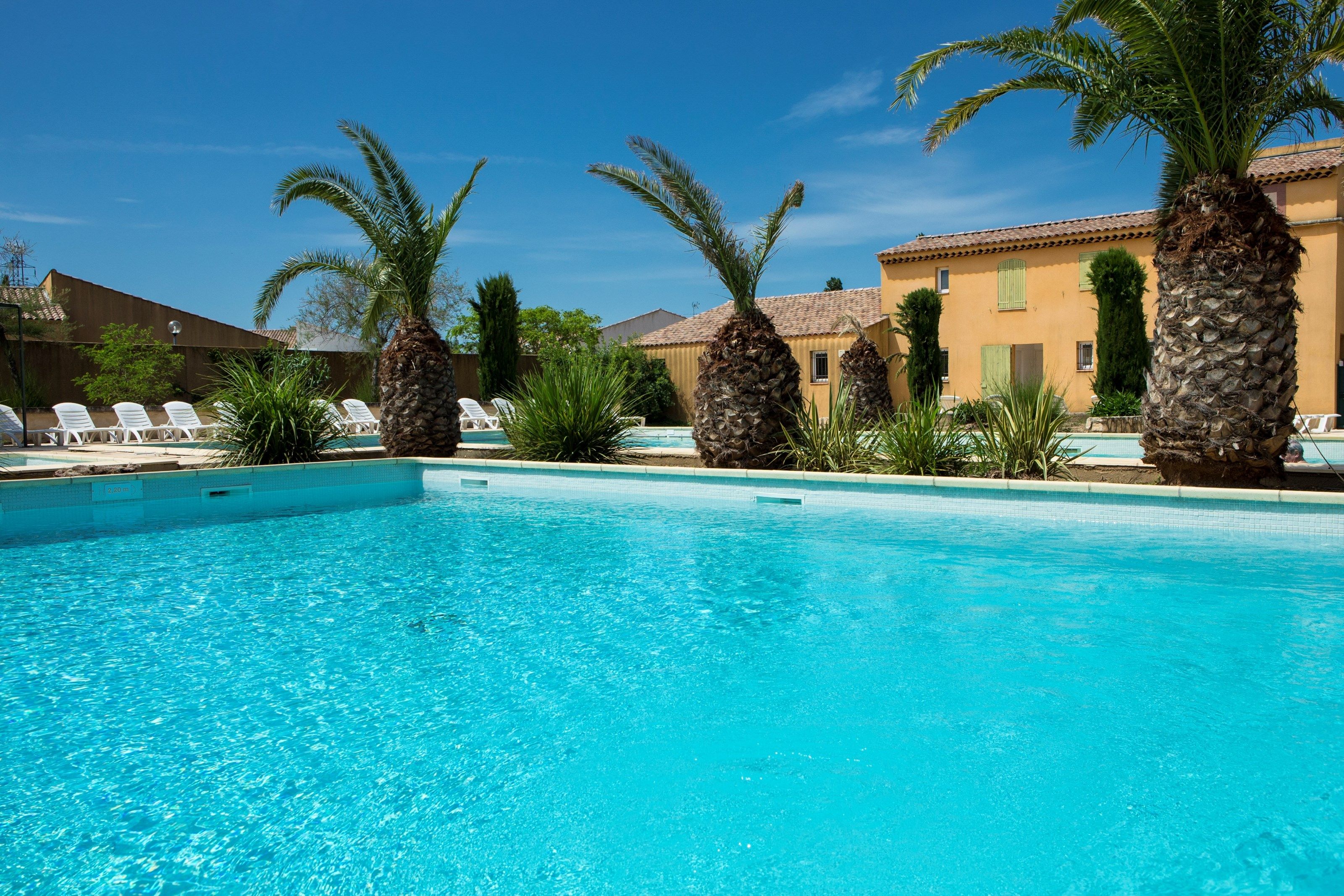 image Take in gorgeous views while lounging around the on-site outdoor pool.