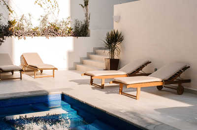 Hang in the pool our by the lounging chairs. 