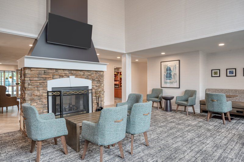 image Gather around the stone fireplace in the cozy lounge