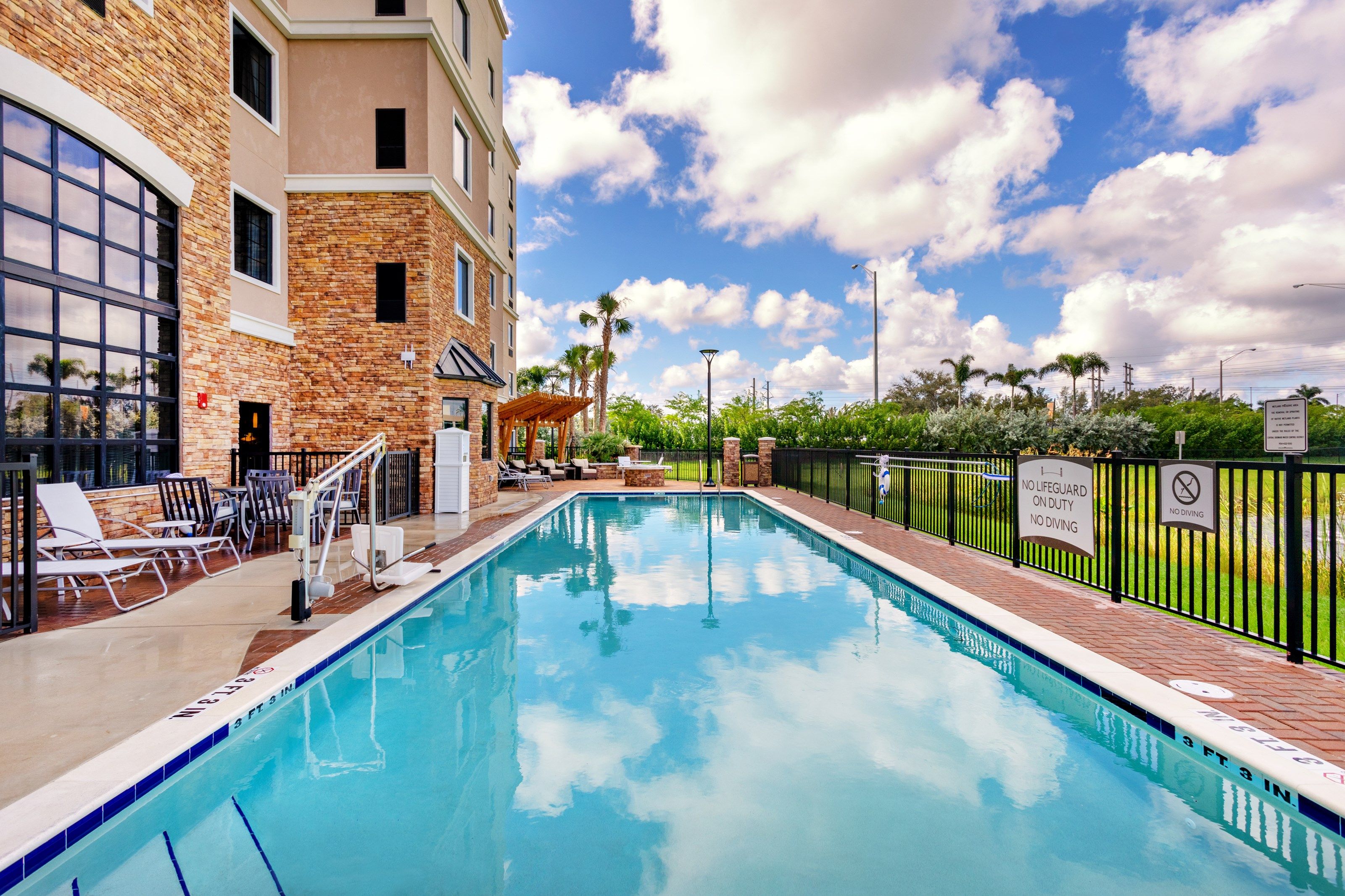 image Outdoor heated pool open year-round — cool off after a day exploring Fort Lauderdale