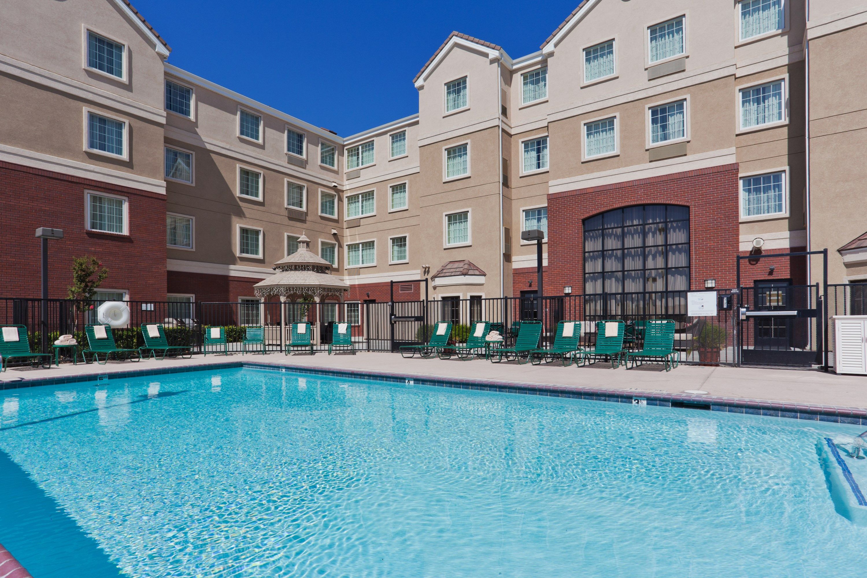 image Take in gorgeous views while lounging around the on-site outdoor pool.