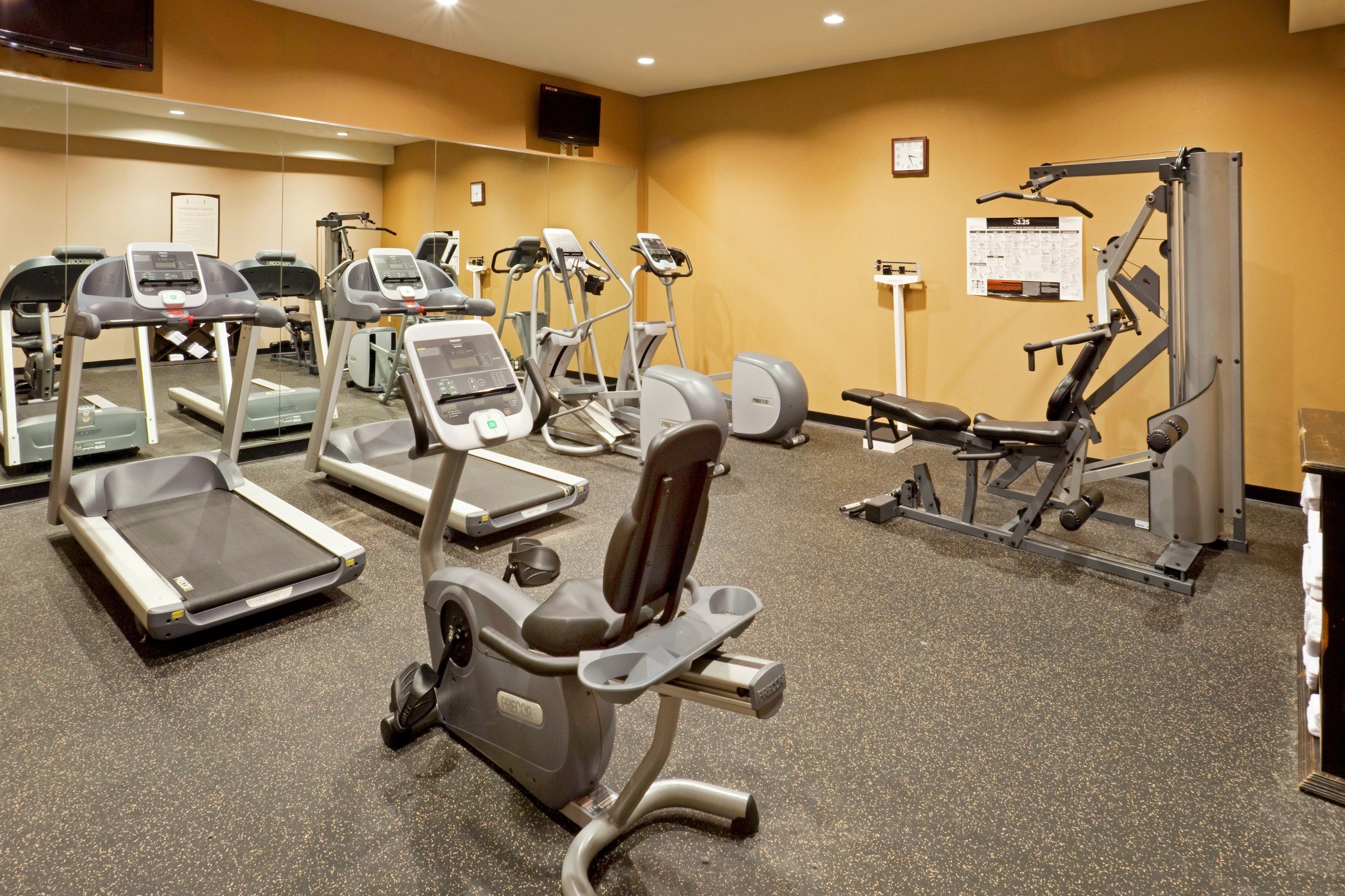 image Fitness center with cardio and weight machines