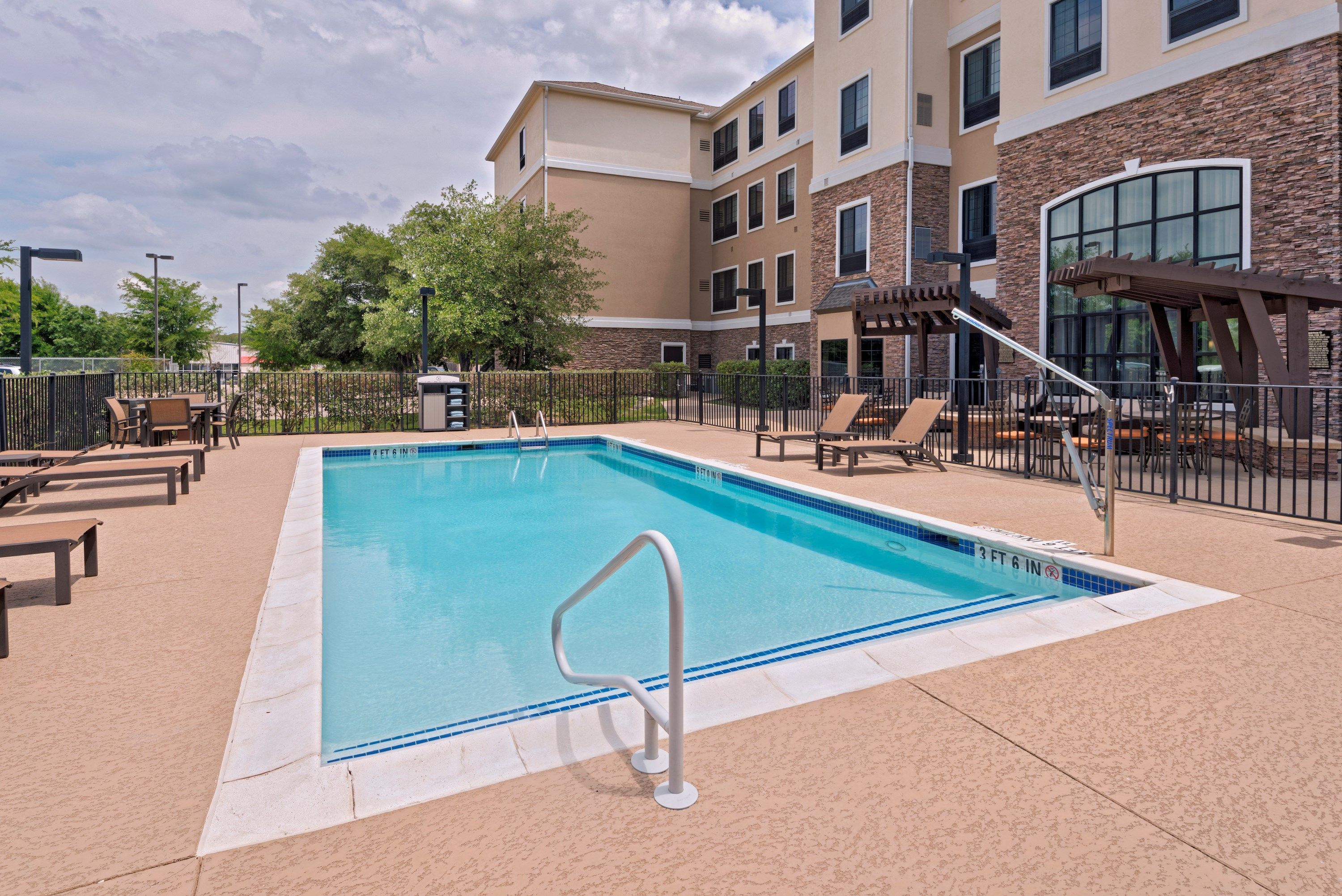 image Take in gorgeous views while lounging around the on-site outdoor pool.