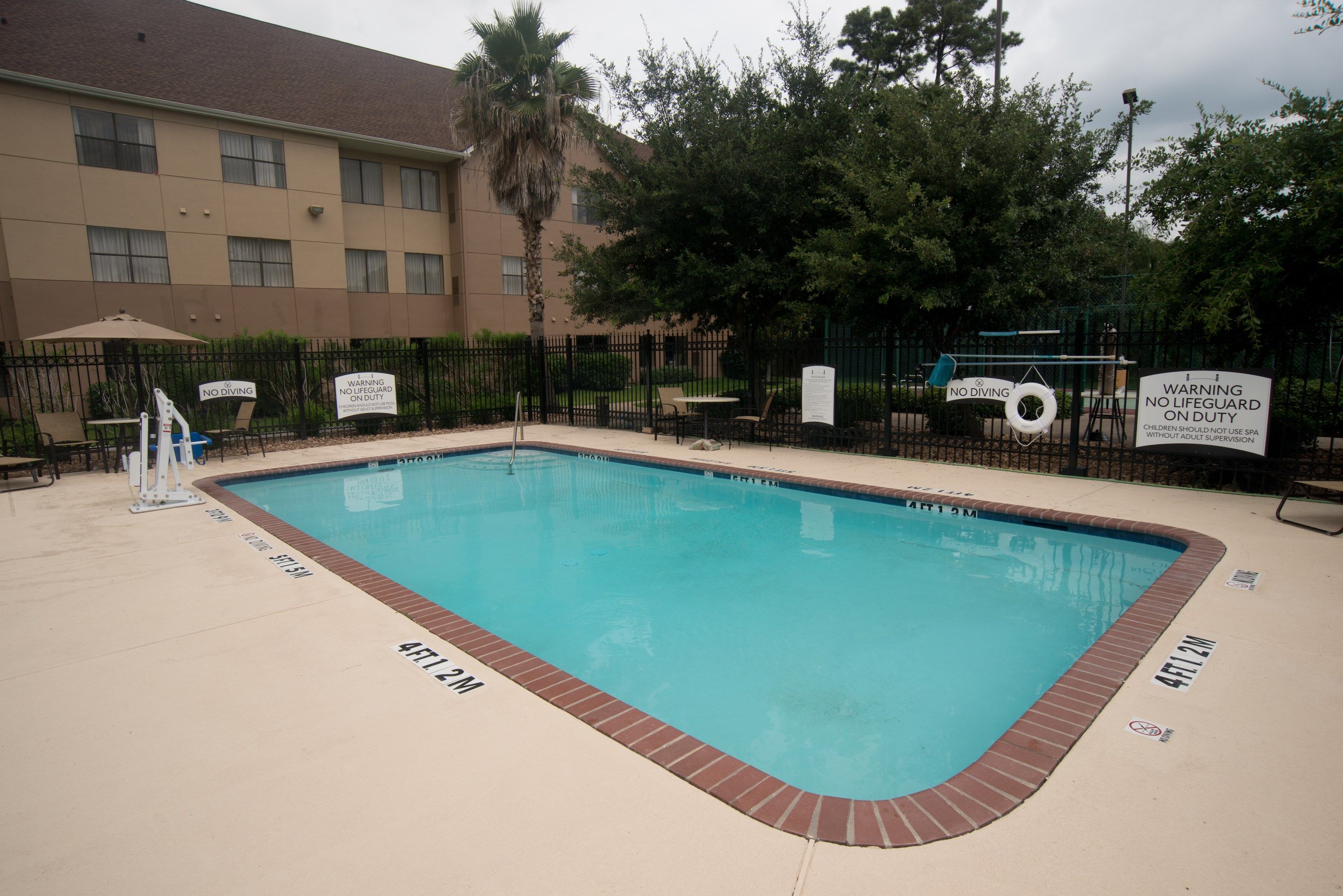 image Spend time with family and friends in the outdoor pool during the summer.