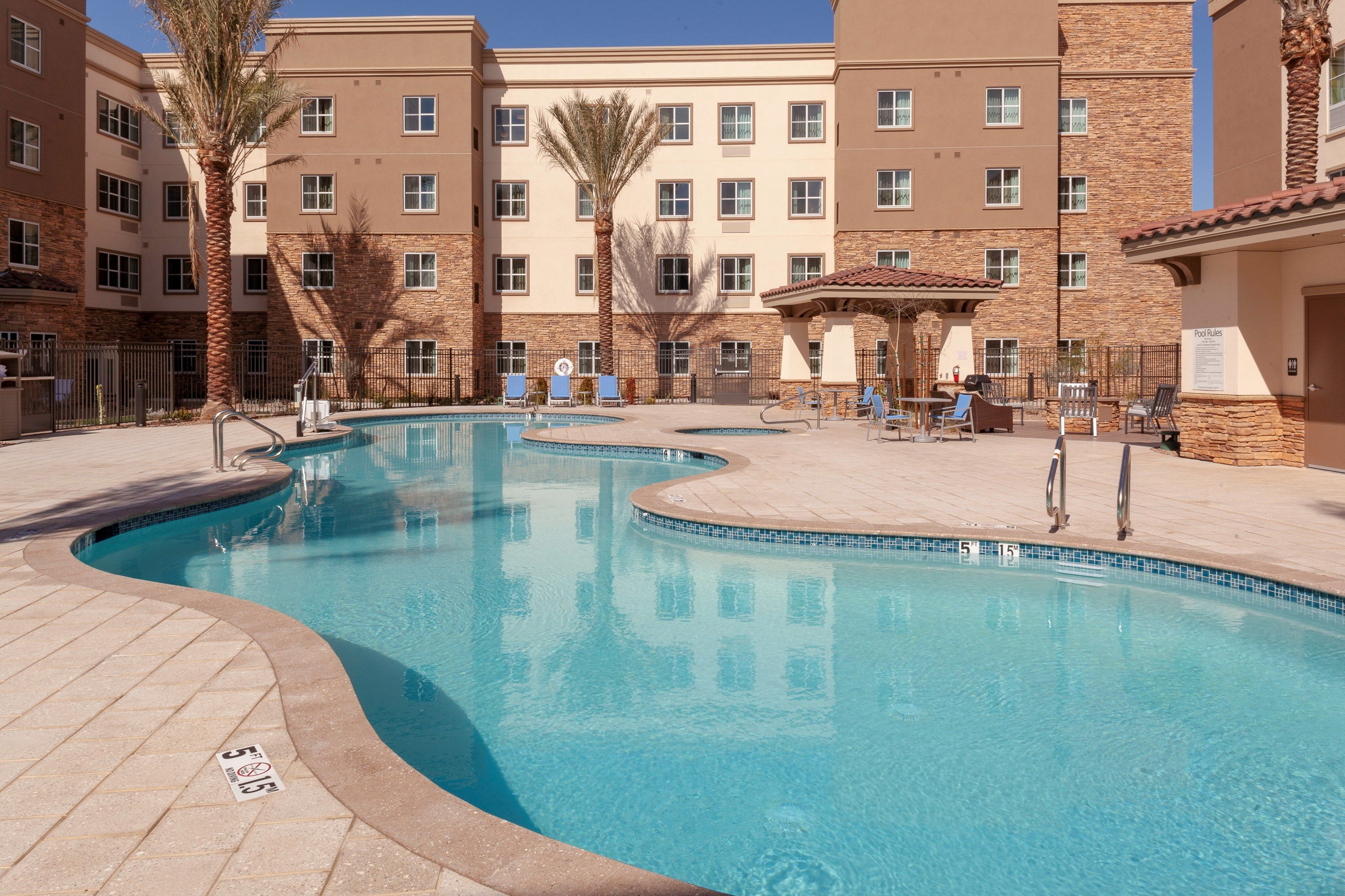 image Take in gorgeous views while lounging around the on-site outdoor pool.