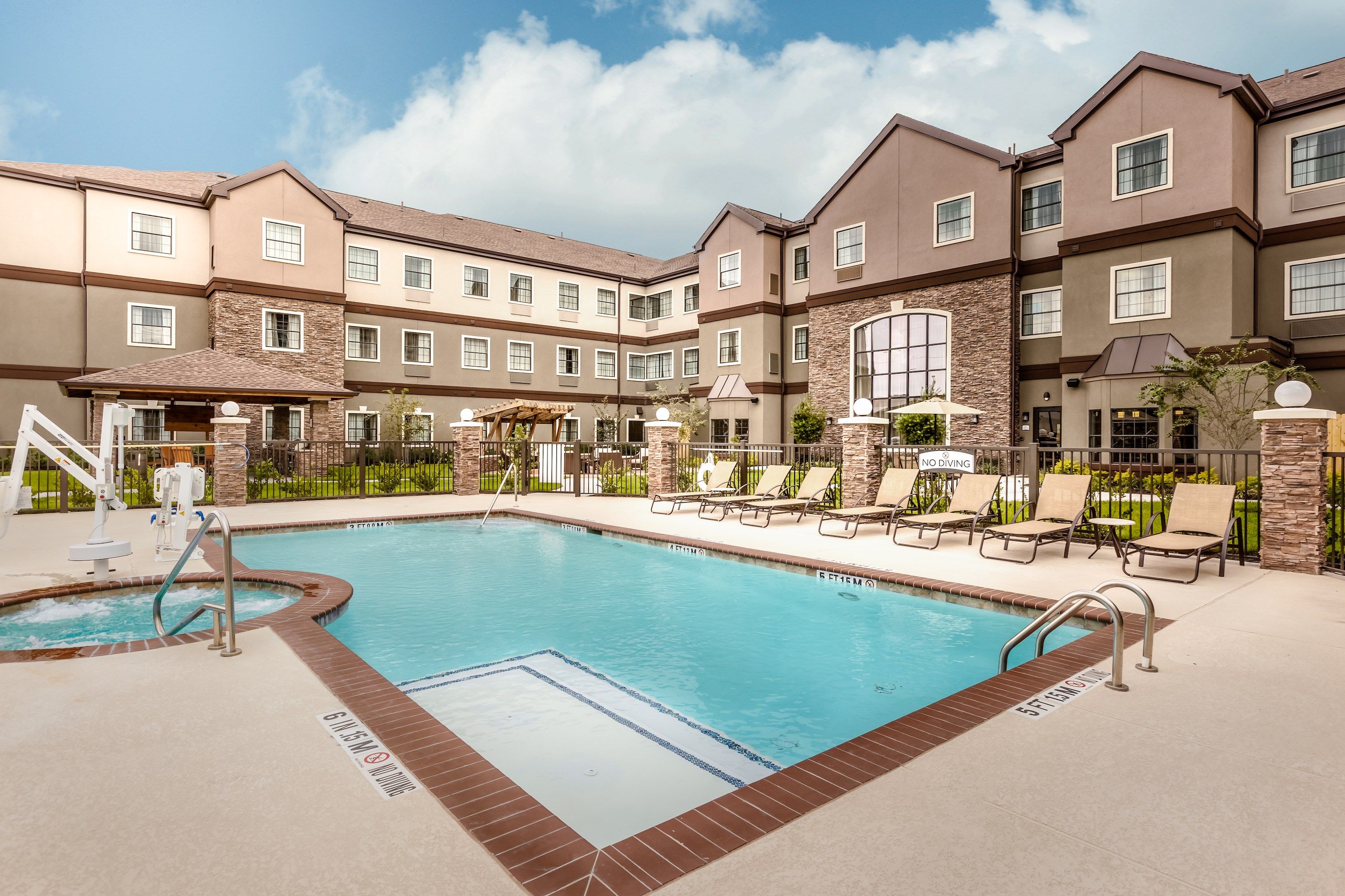 image Take in gorgeous views while lounging around the on-site outdoor pool.