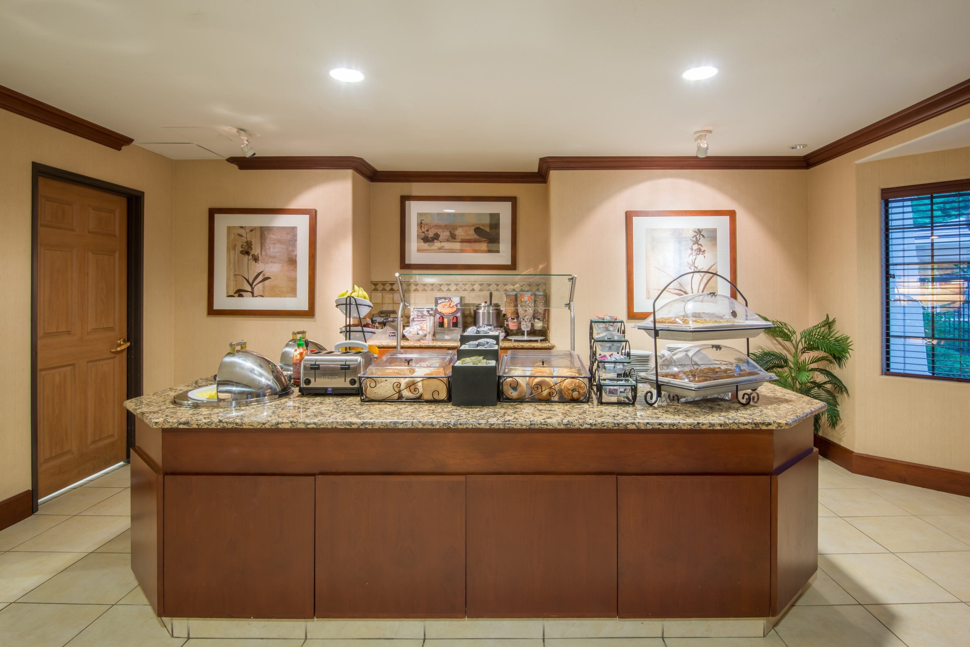 image Breakfast buffet displaying a variety of food options.