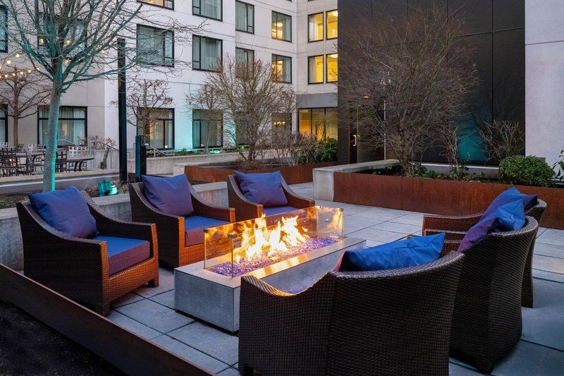 image Outdoor patio with cozy fireside seating