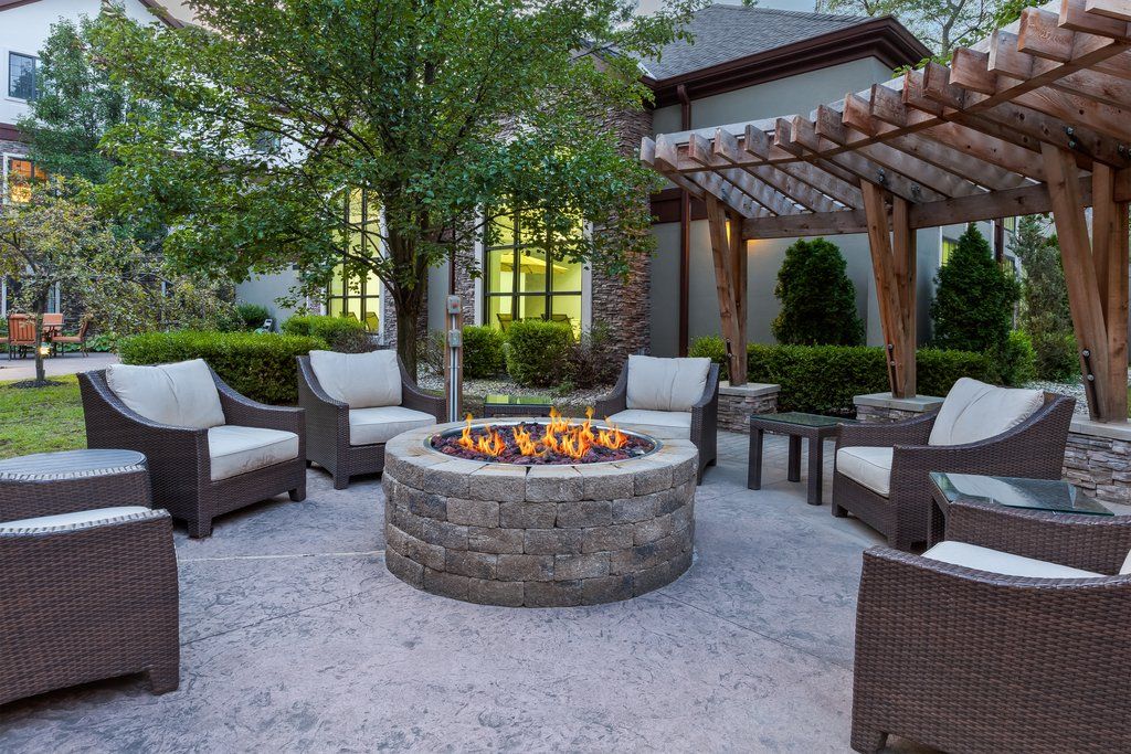 image Gather around the cozy fire pit and enjoy evenings filled with warmth and conversation.