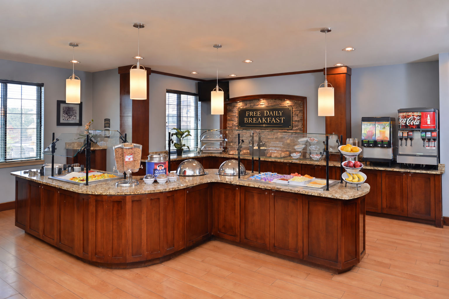 image Breakfast bar with hot food and beverage options.