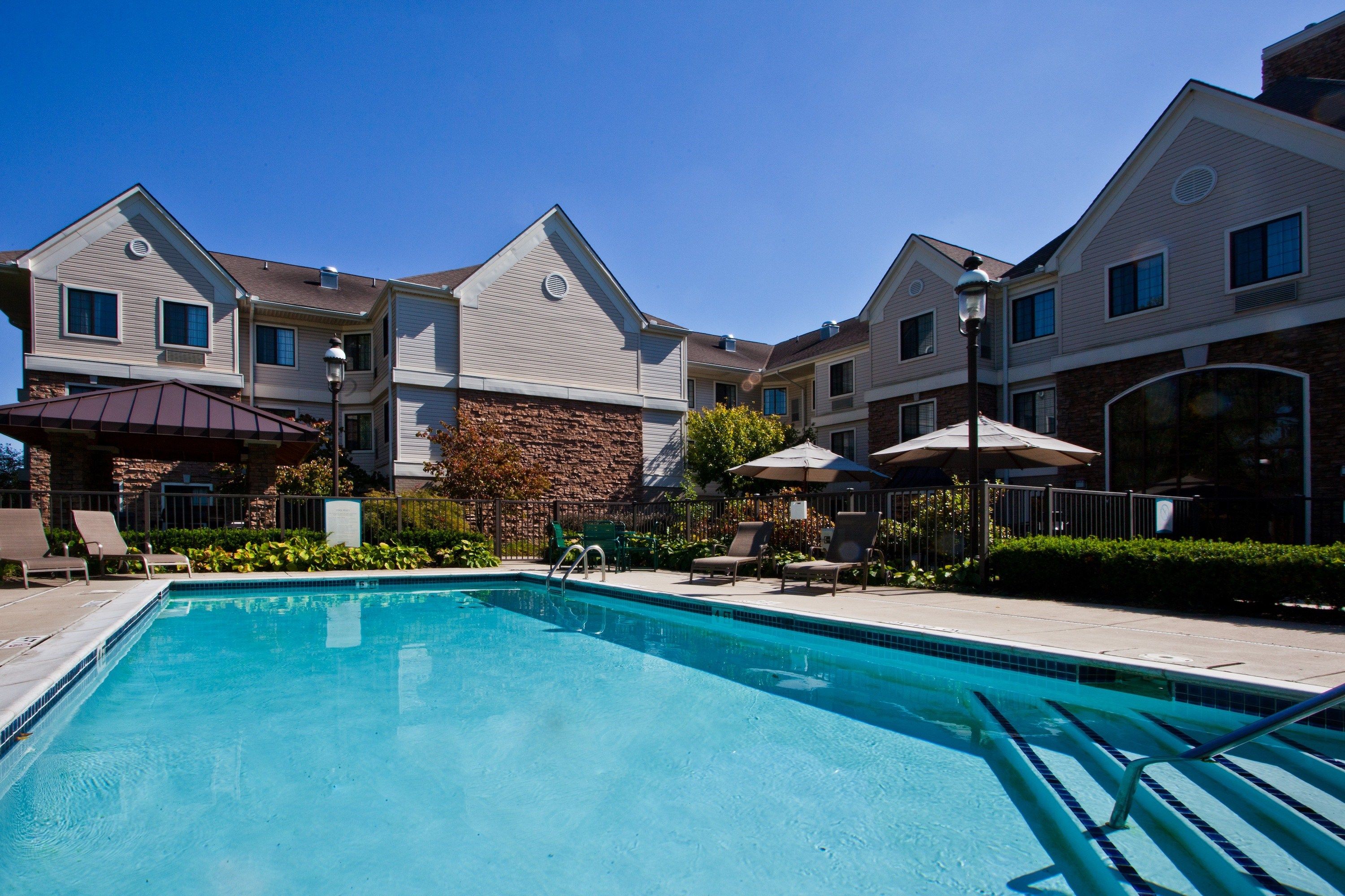 image Take in gorgeous views while lounging around the on-site outdoor pool.