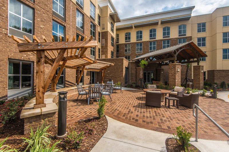 image Outdoor patio area with comfortable seating, ideal for relaxing in the South Carolina sunshine.