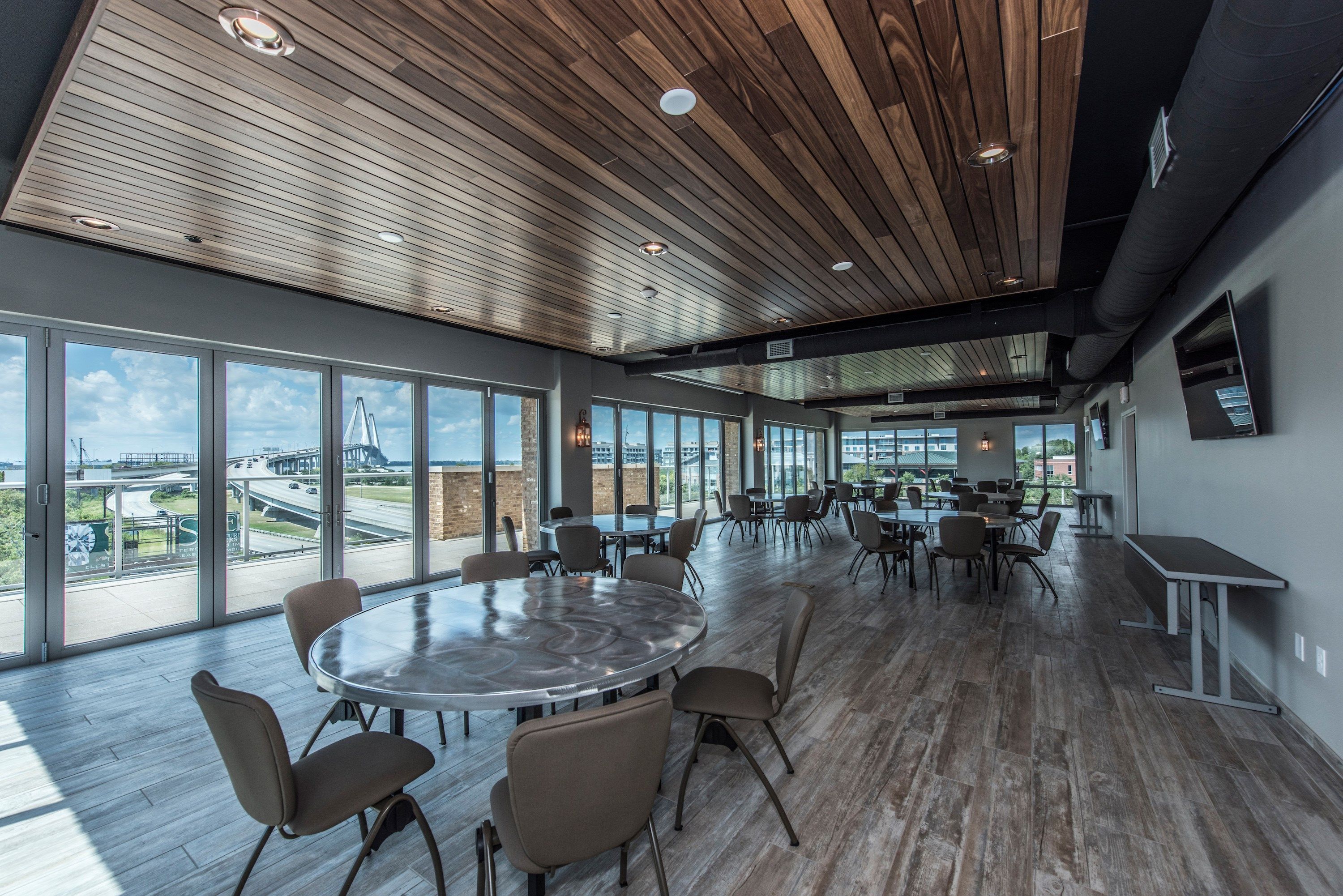 image Dining room with tables and large windows.